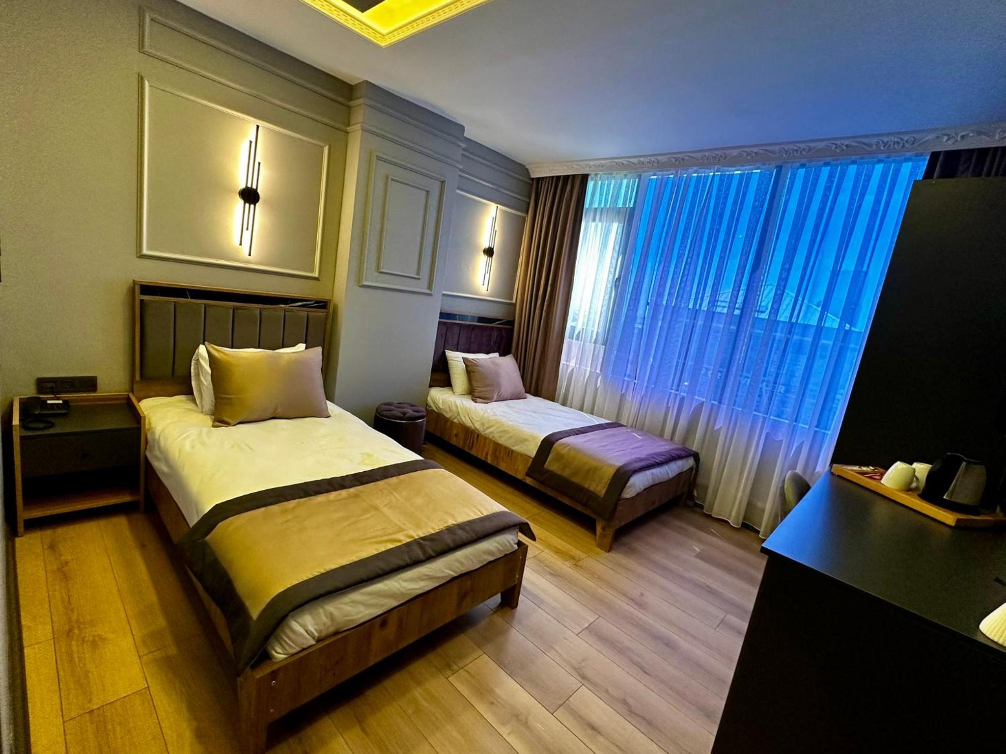 Standard Twin Room - Photo 9