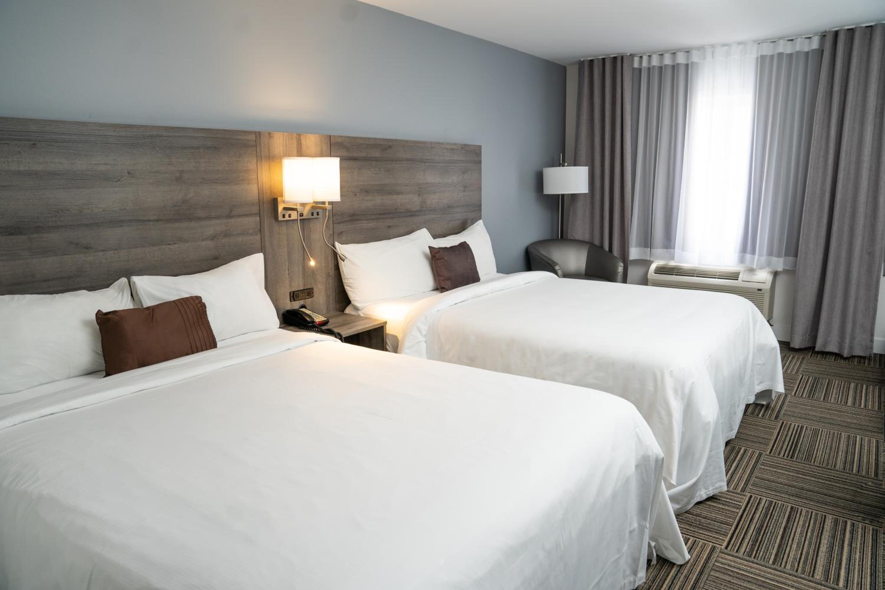 Queen Room with Two Queen Beds - Photo 1
