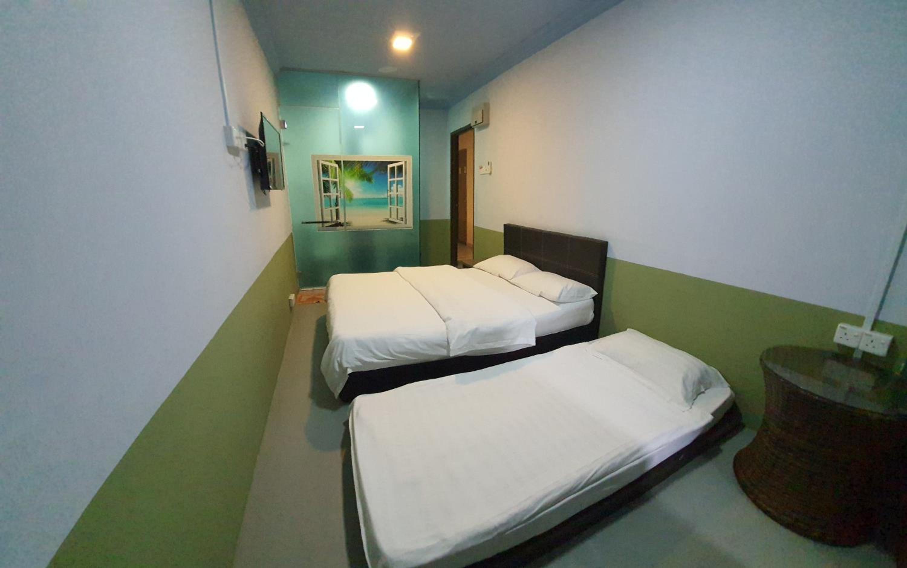 Deluxe Triple Room - Photo 1