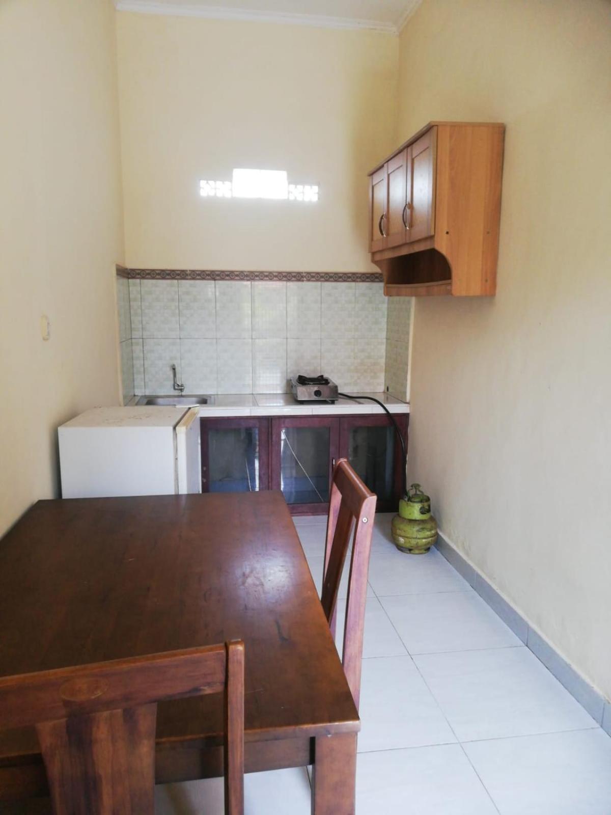 Deluxe Room with Kitchen - Photo 2