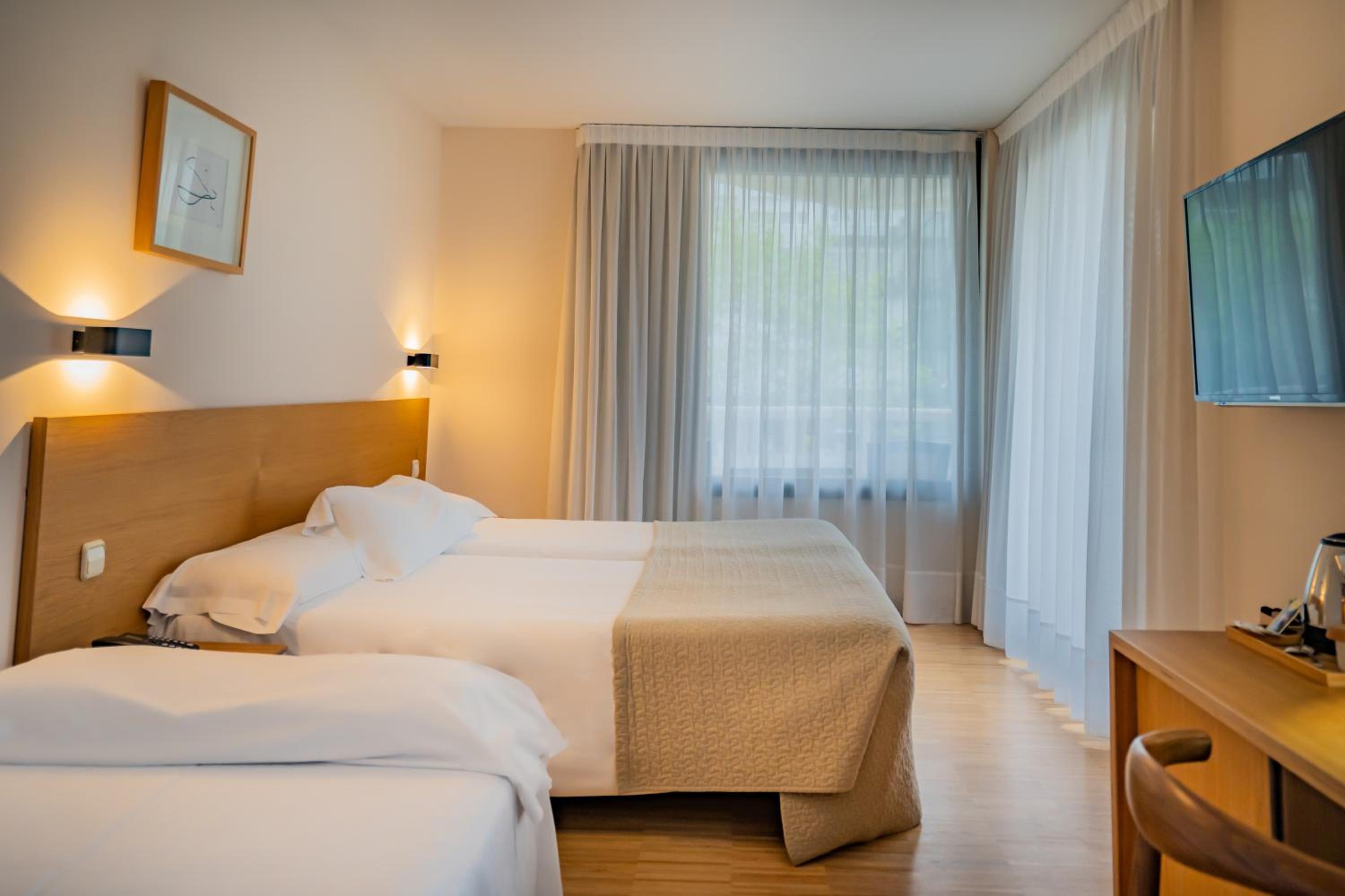 Habitación Doble o con Dos Camas con Cama Extra y Terraza (3 Adultos)