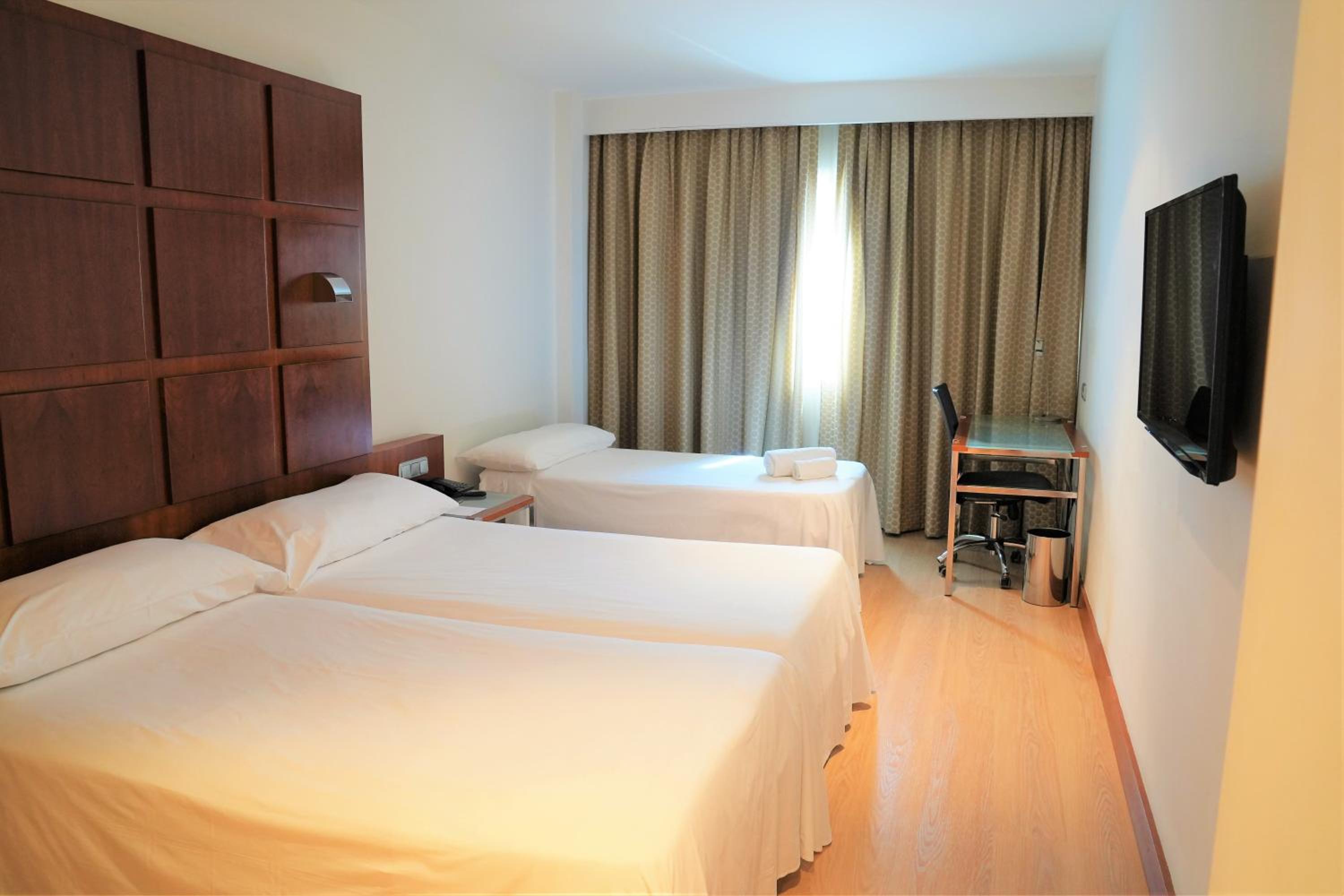 Habitación Triple con Traslado al Aeropuerto
