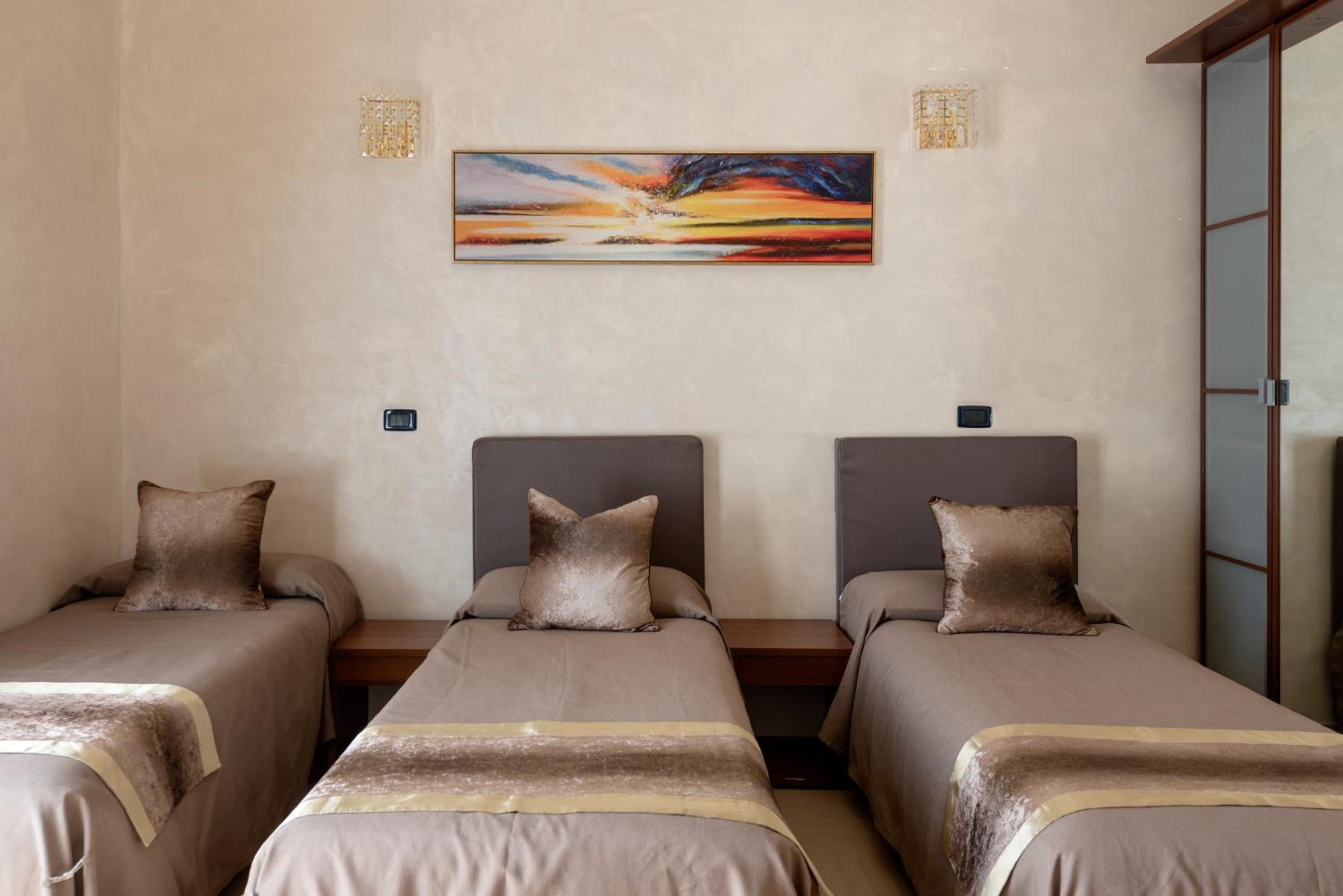 Quadruple Room with Private Bathroom