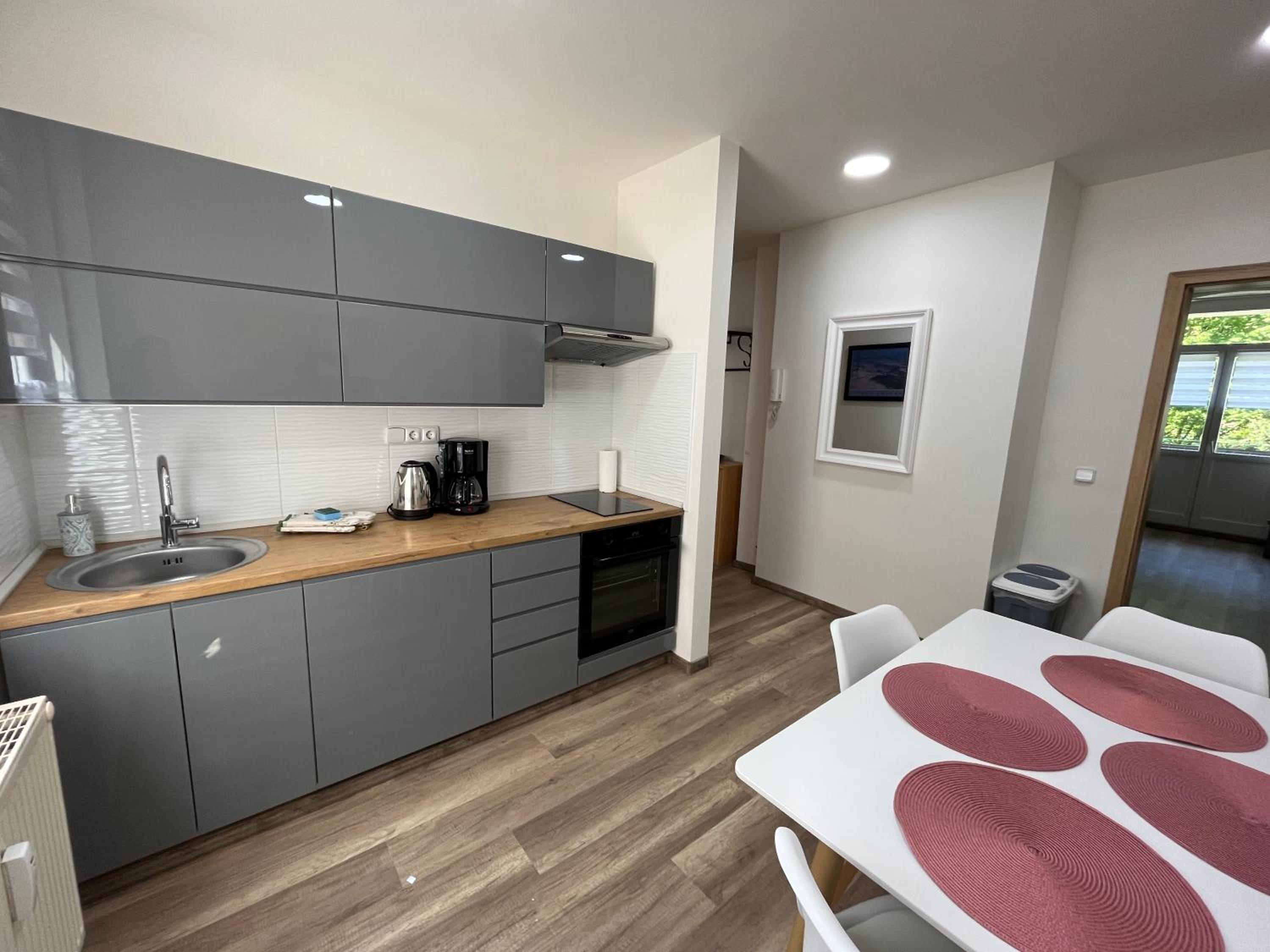 Apartment with Balcony - Photo 7