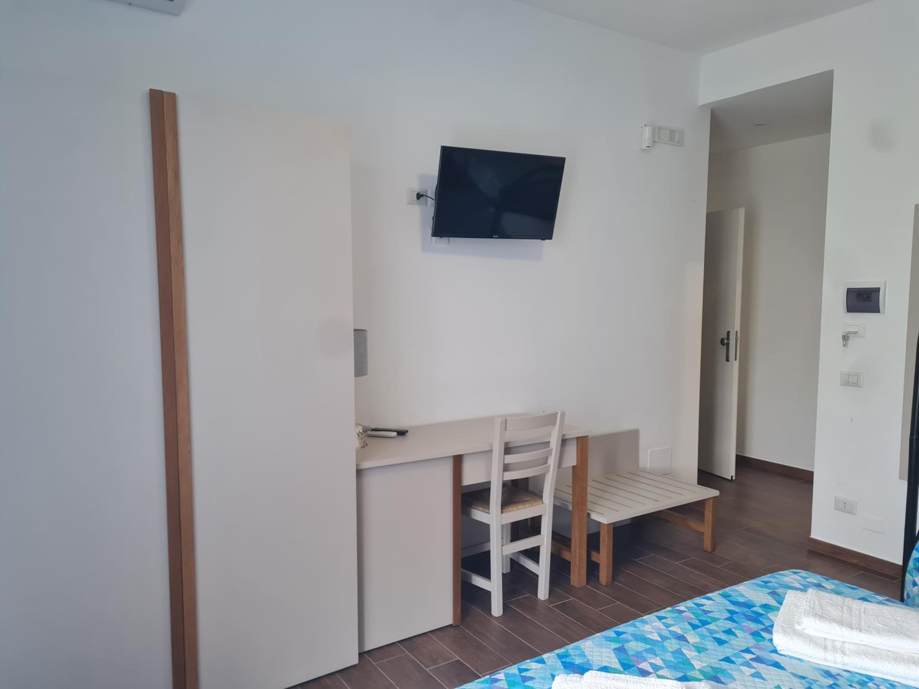 Quadruple Room with Private Bathroom