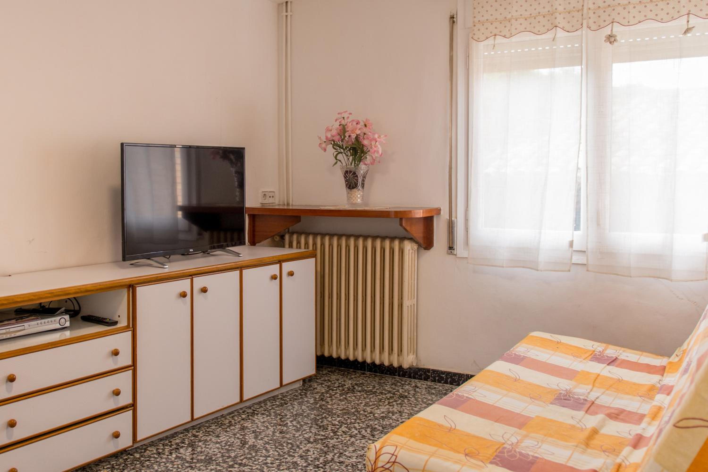 Apartamento de un dormitorio superior con balcón