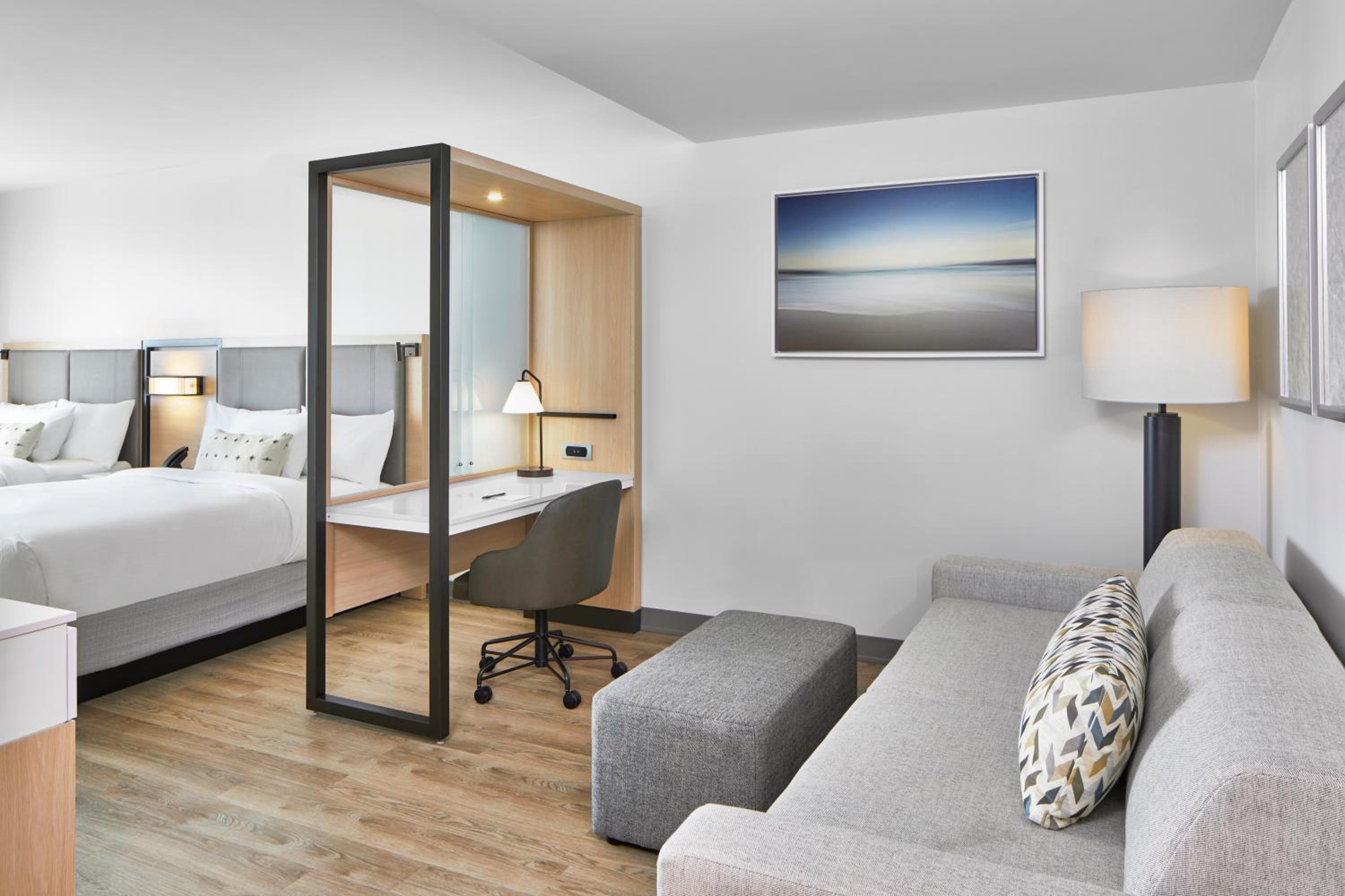 Queen Studio Suite with Trundle Bed and Partial Ocean View