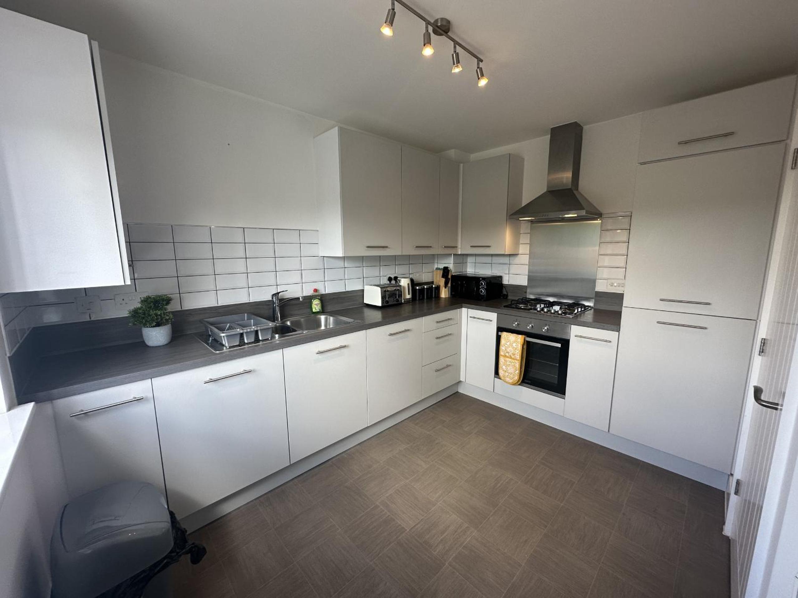 Three-Bedroom House photo 3
