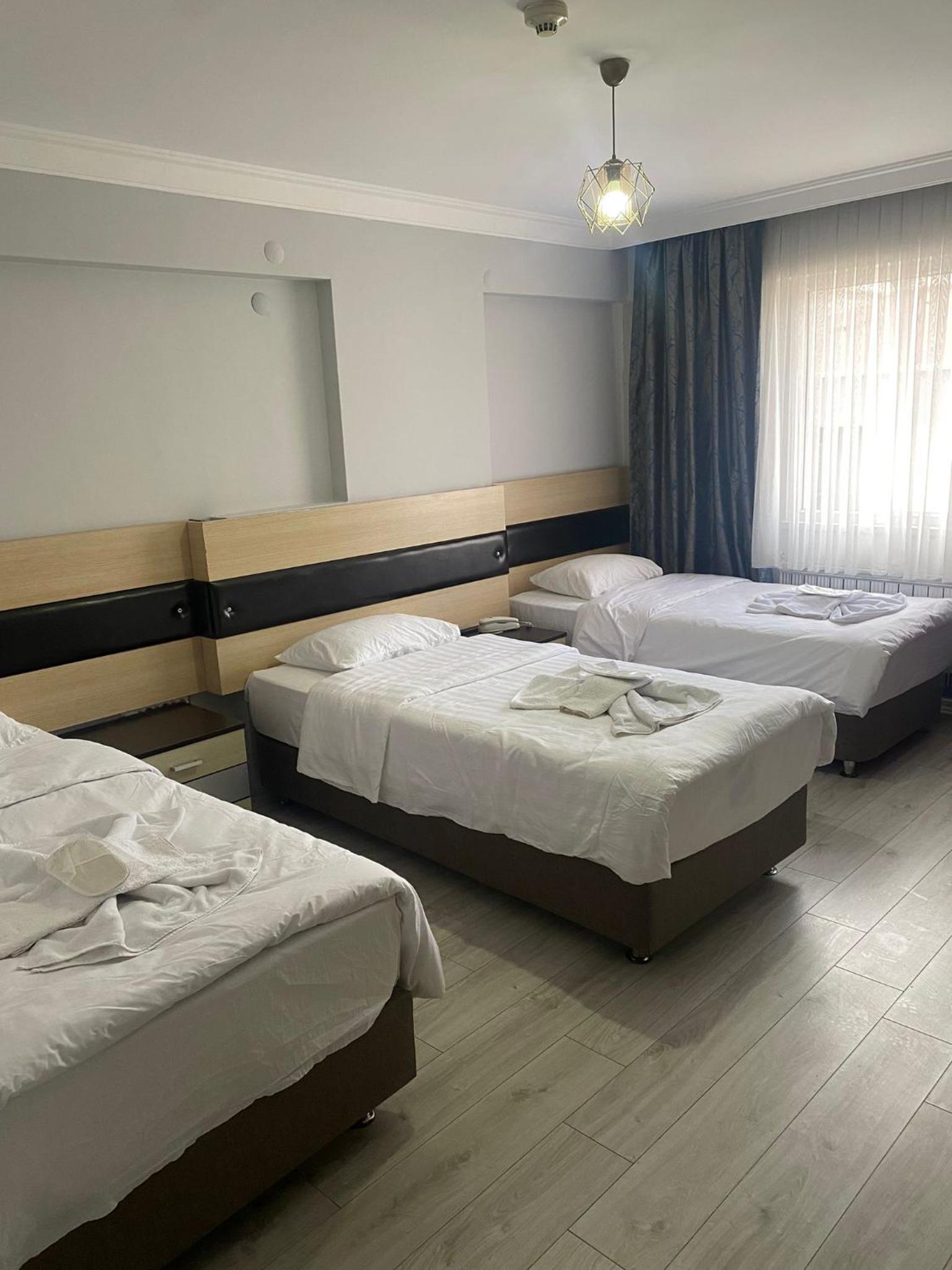 Standard Triple Room - Photo 8