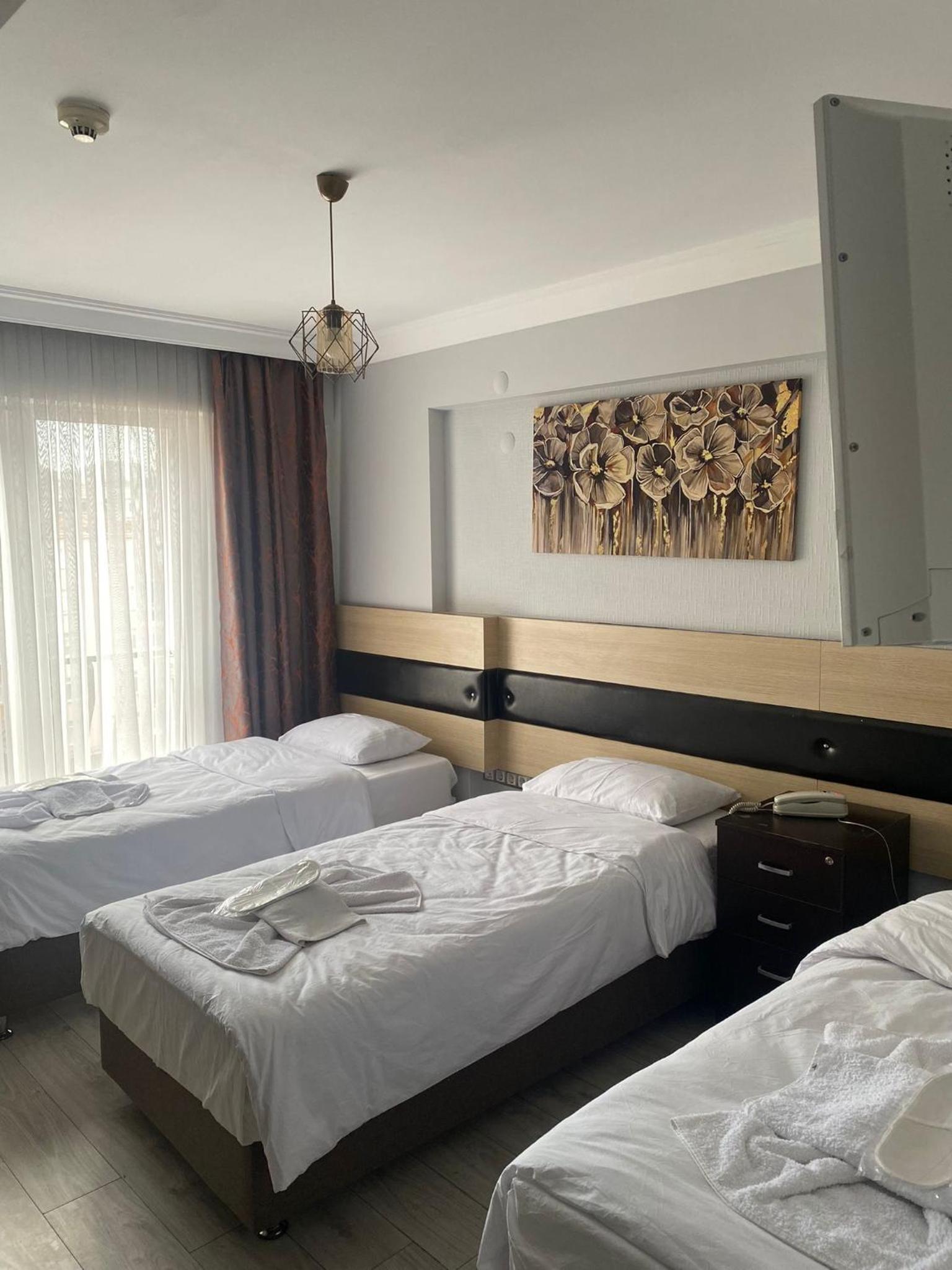 Standard Triple Room - Photo 1