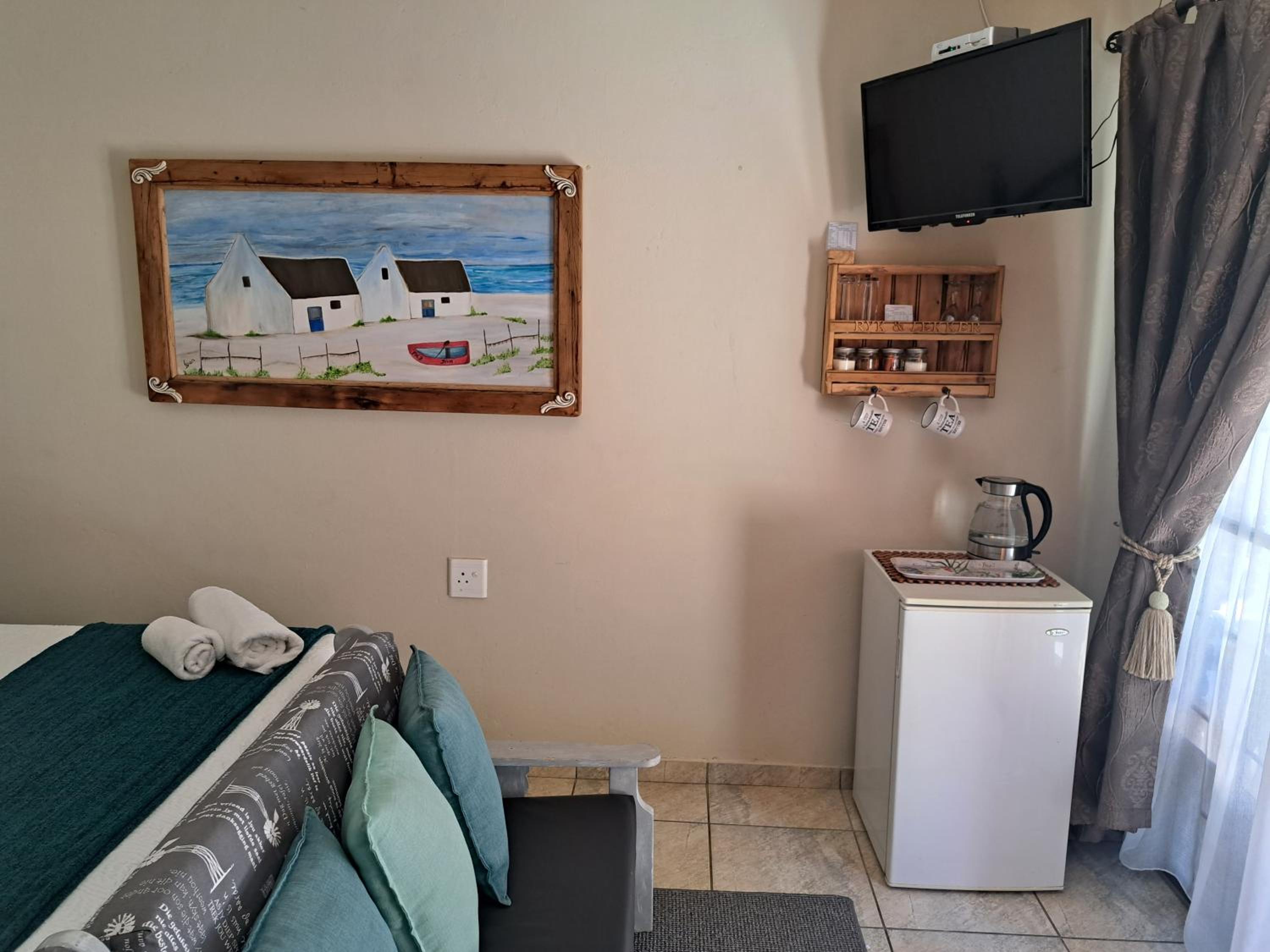 Deluxe Queen Room - Photo 8