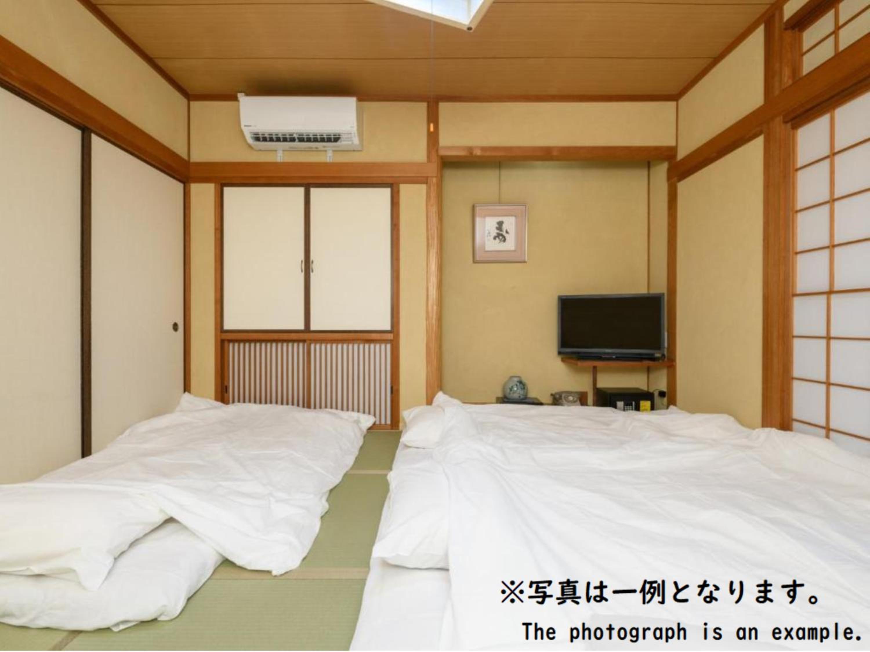 Quadruple Room with Shared Bathroom photo 2