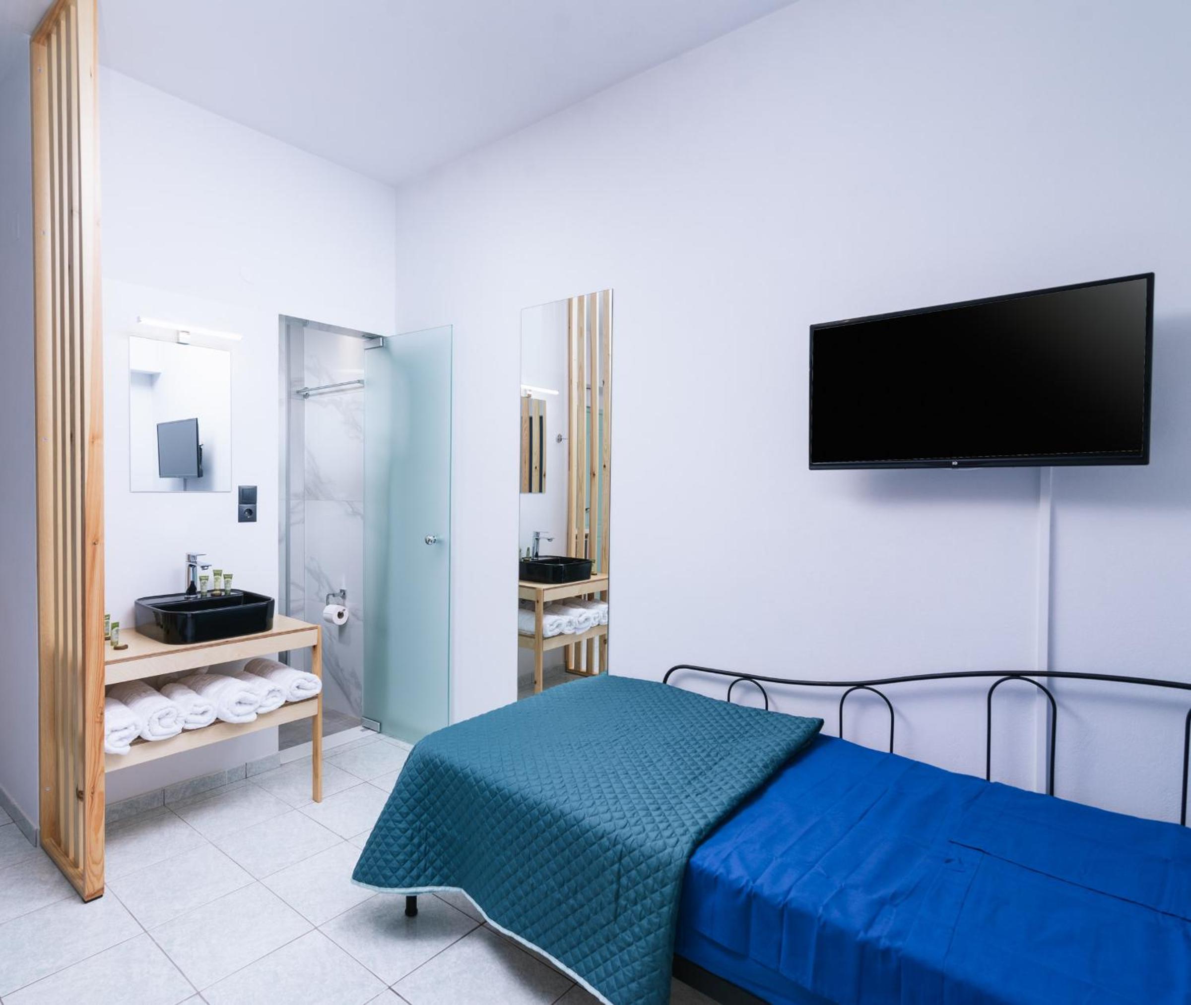 Deluxe Triple Room - Photo 7