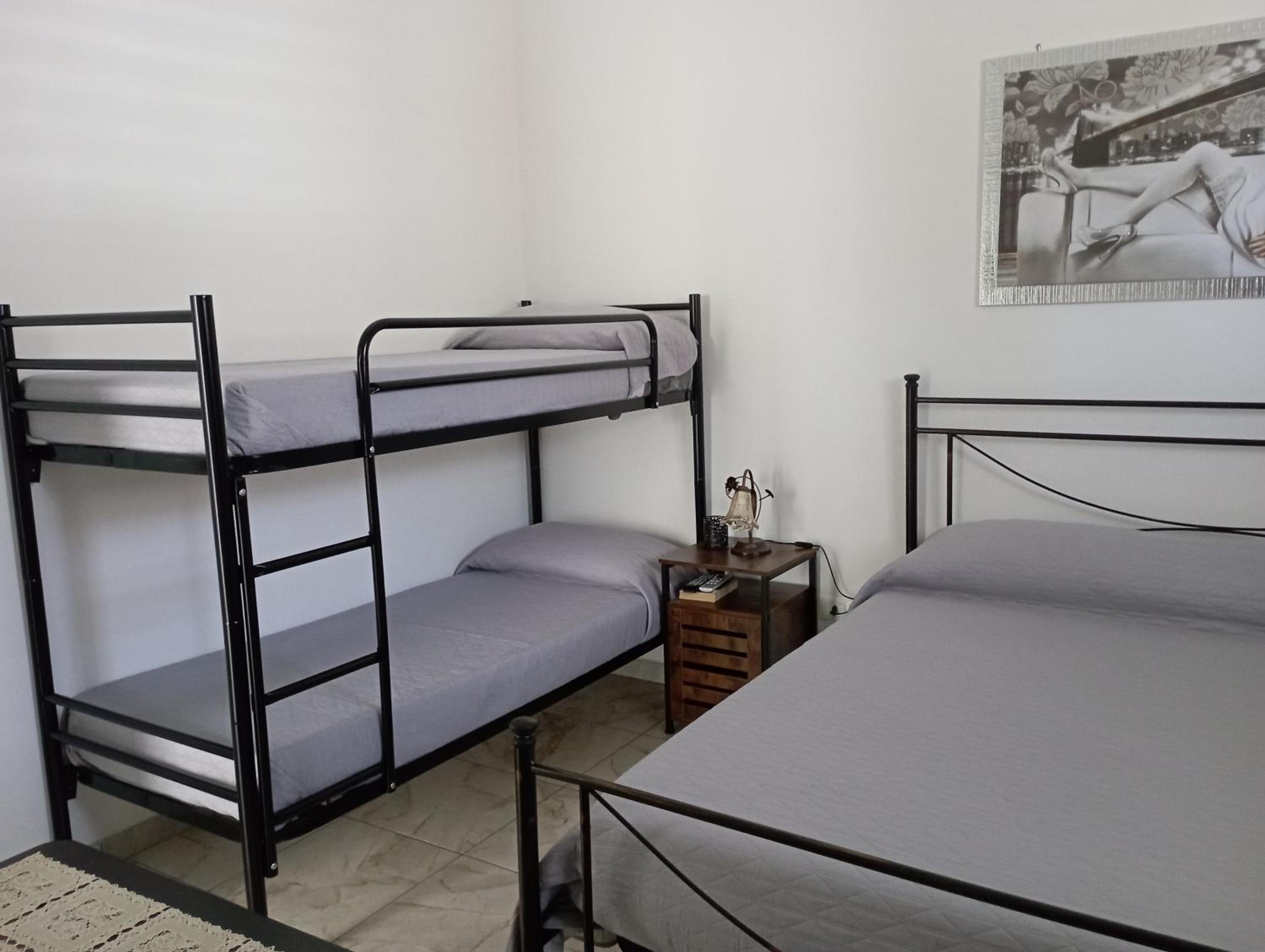 Quadruple Room - Photo 15