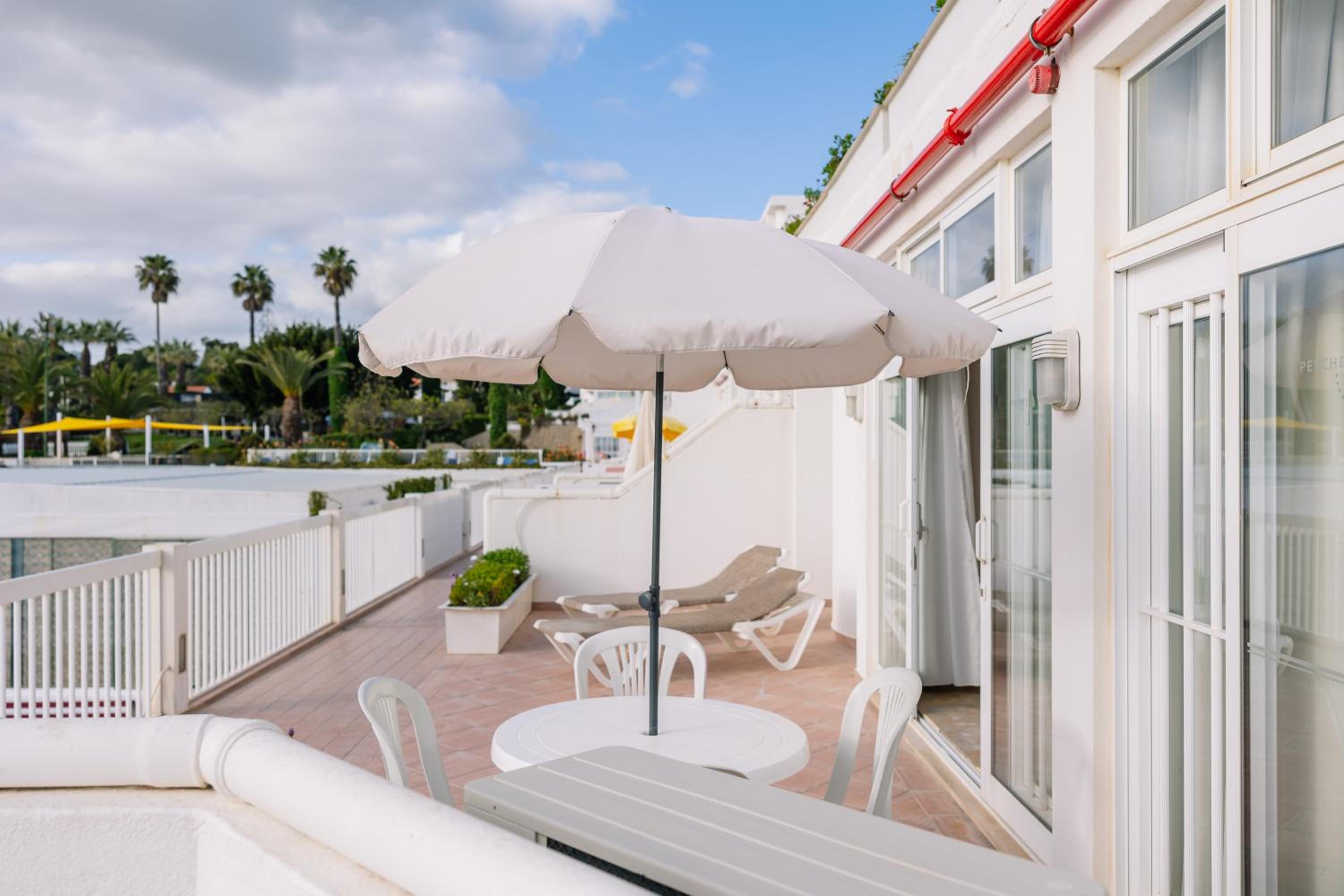 Relax and unwind on your private balcony oasis.