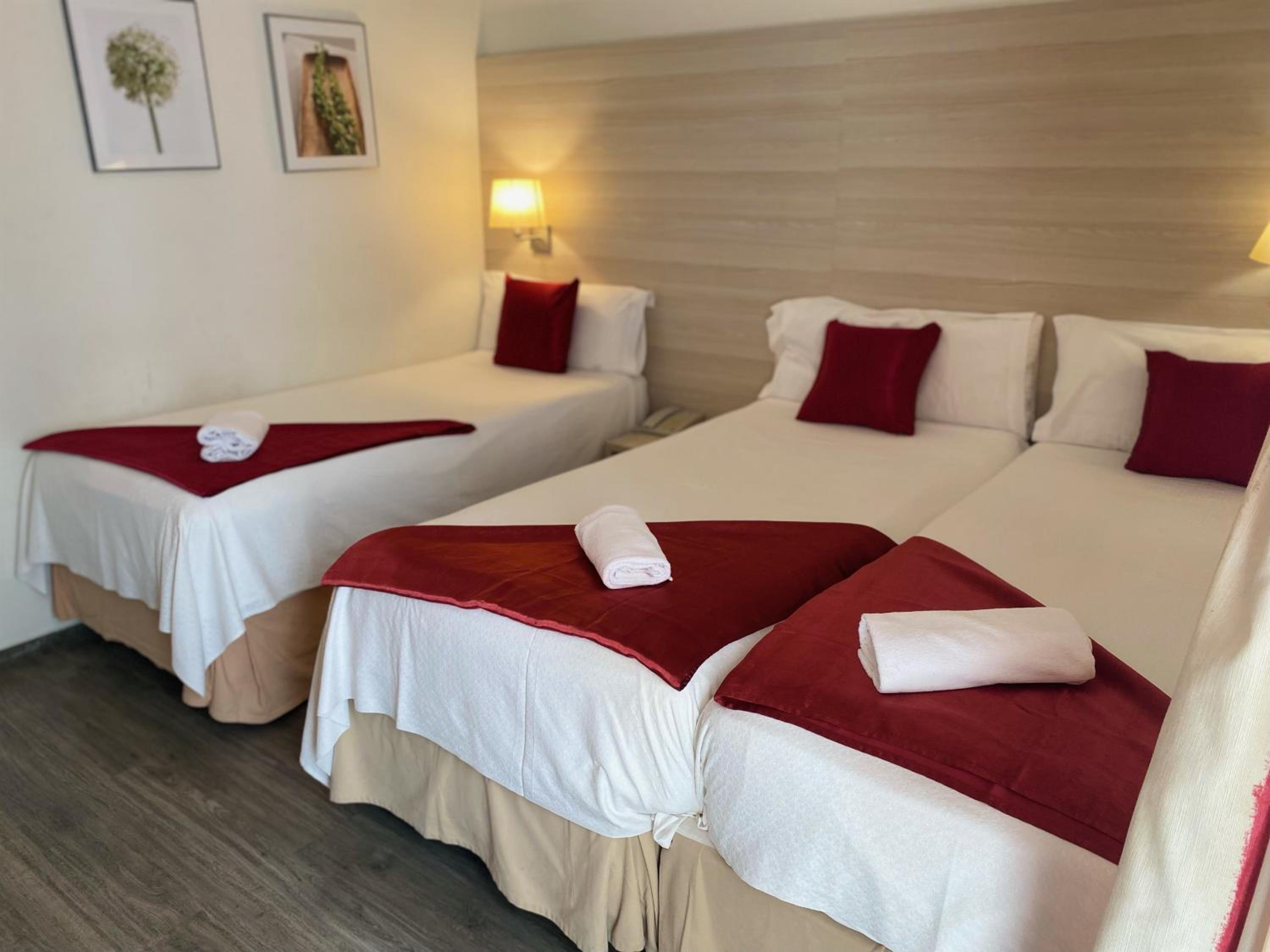 Habitación Triple con Balcón