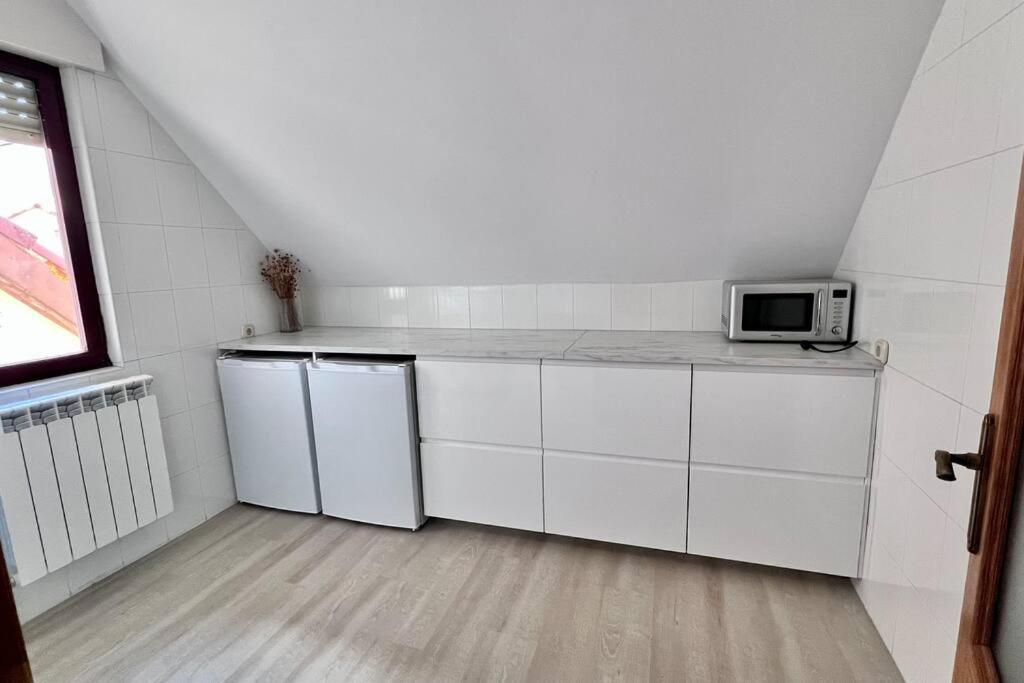 Three-Bedroom Apartment photo 2