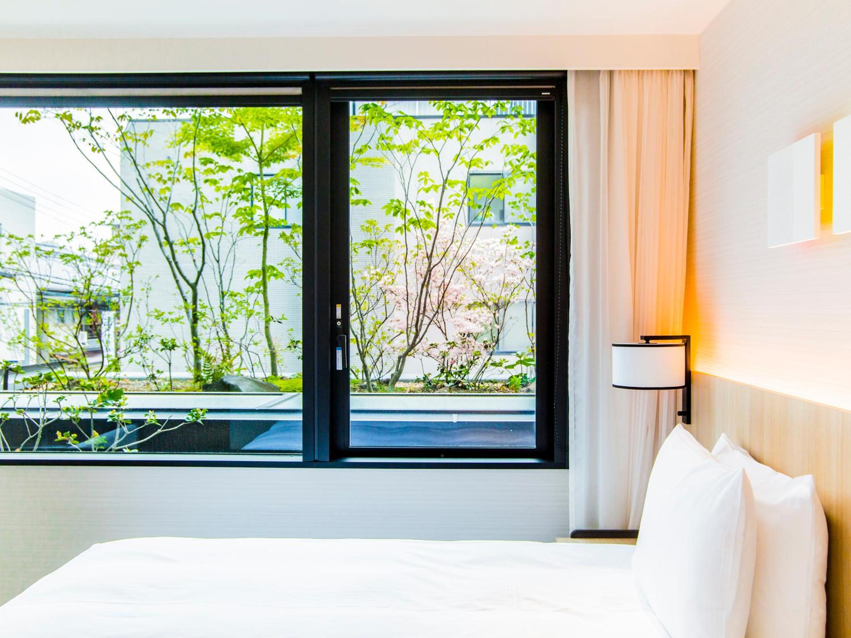 Twin Room with Bathtub - Garden View - Photo 10
