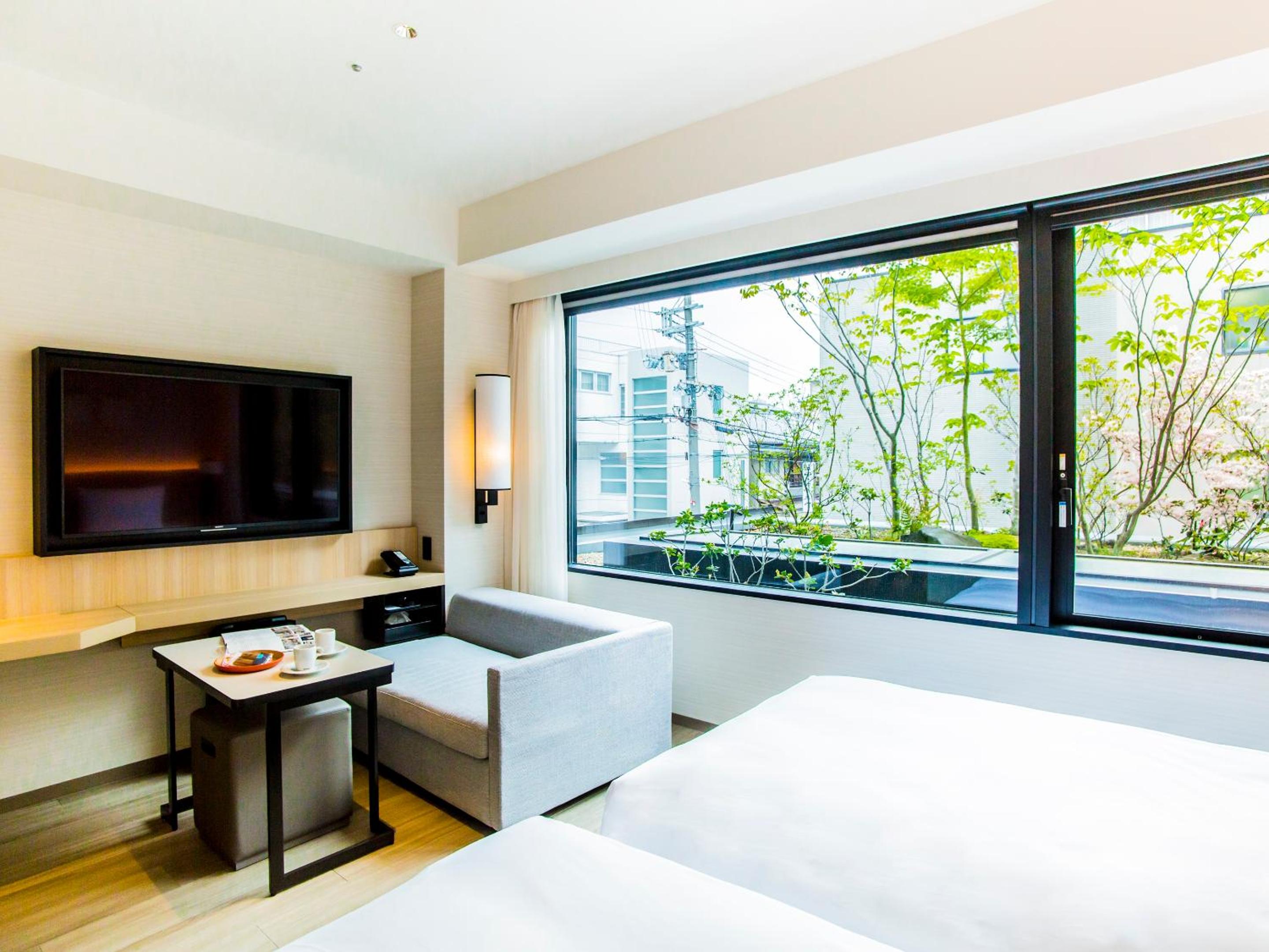 Twin Room with Bathtub - Garden View - Photo 7