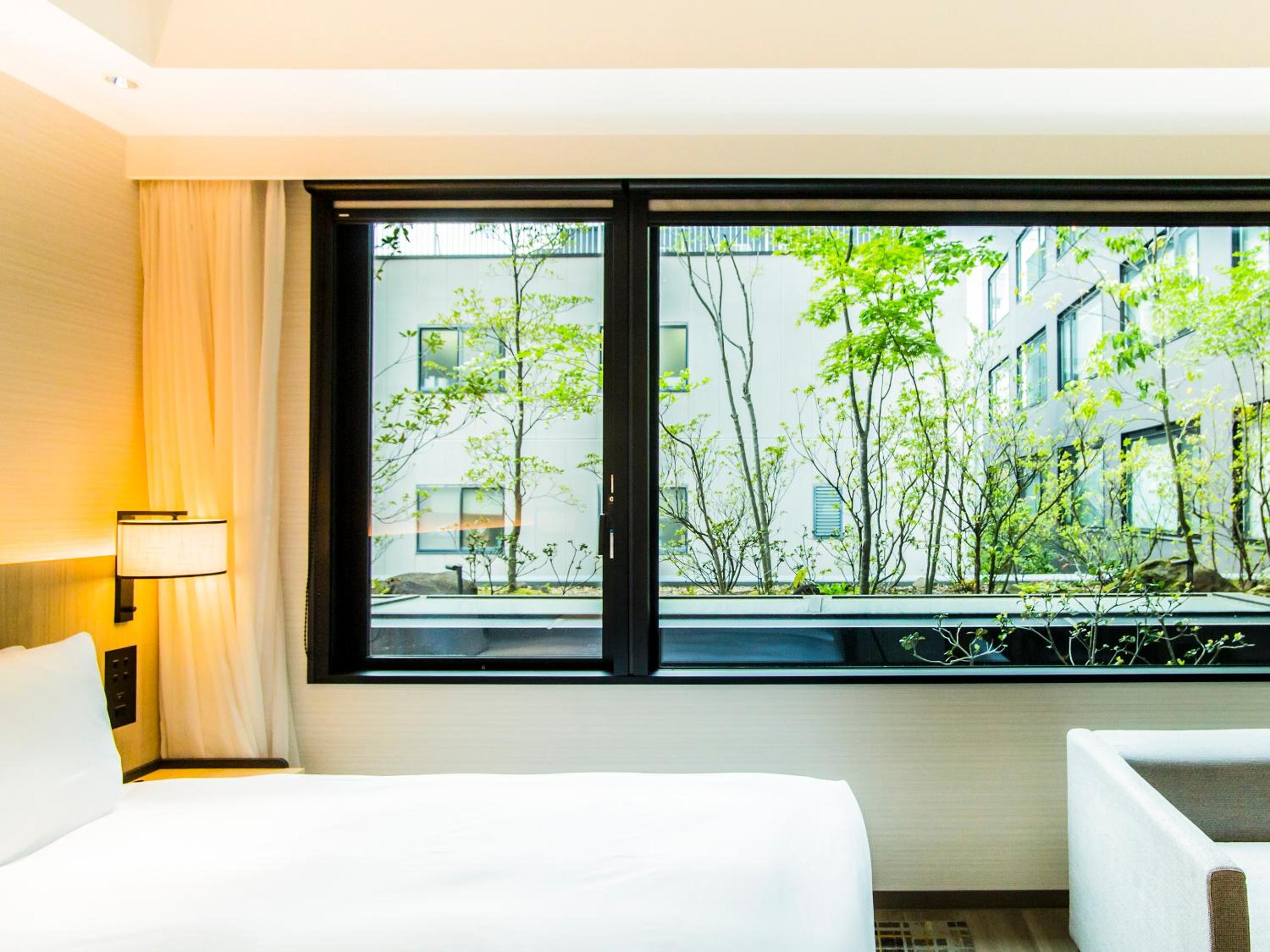 Twin Room with Bathtub - Garden View - Photo 6