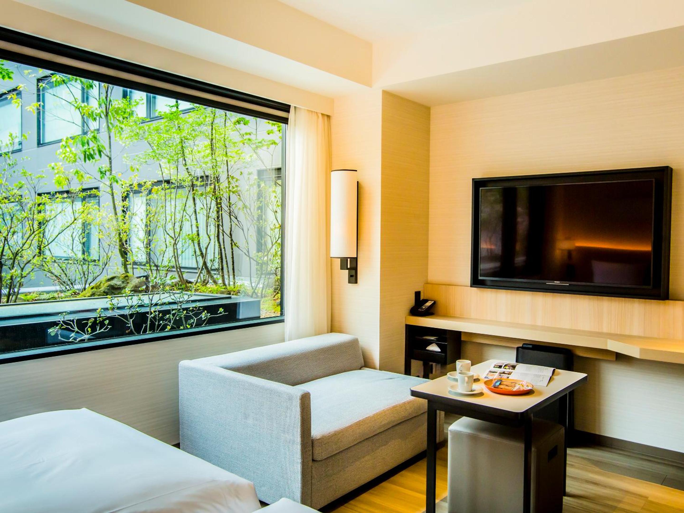 Twin Room with Bathtub - Garden View - Photo 5
