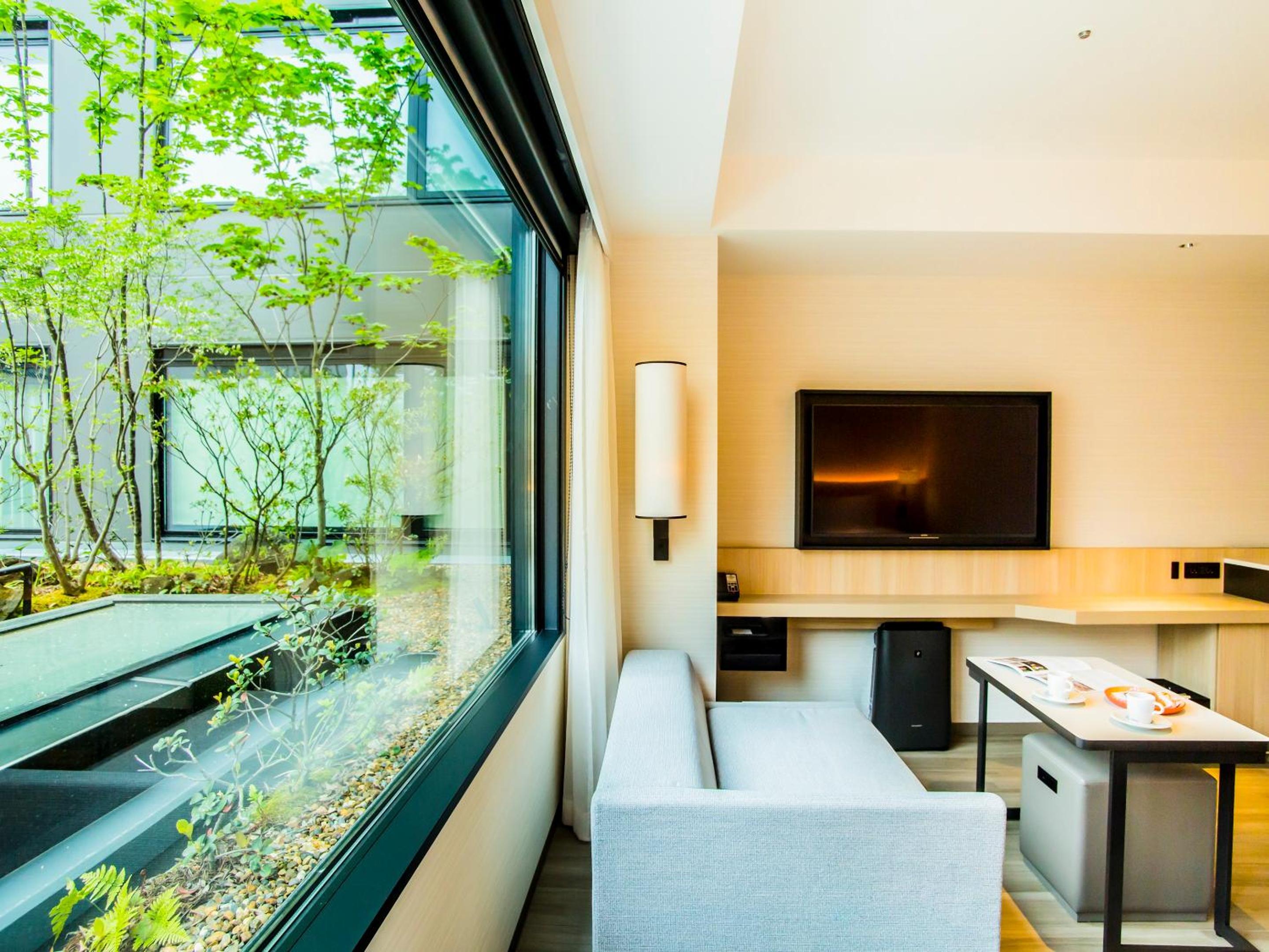 Twin Room with Bathtub - Garden View - Photo 4