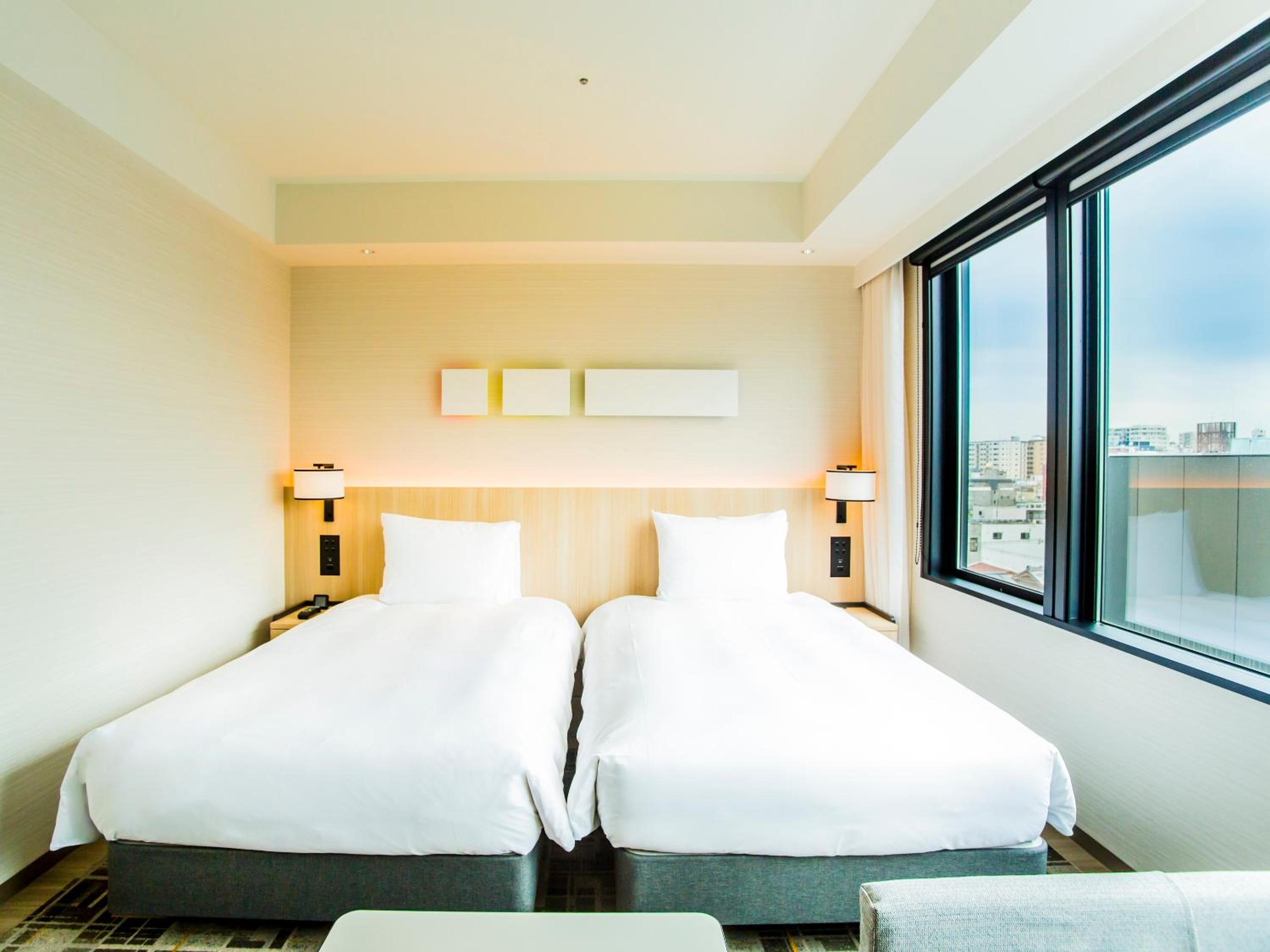Twin Room with Bathtub - Photo 1