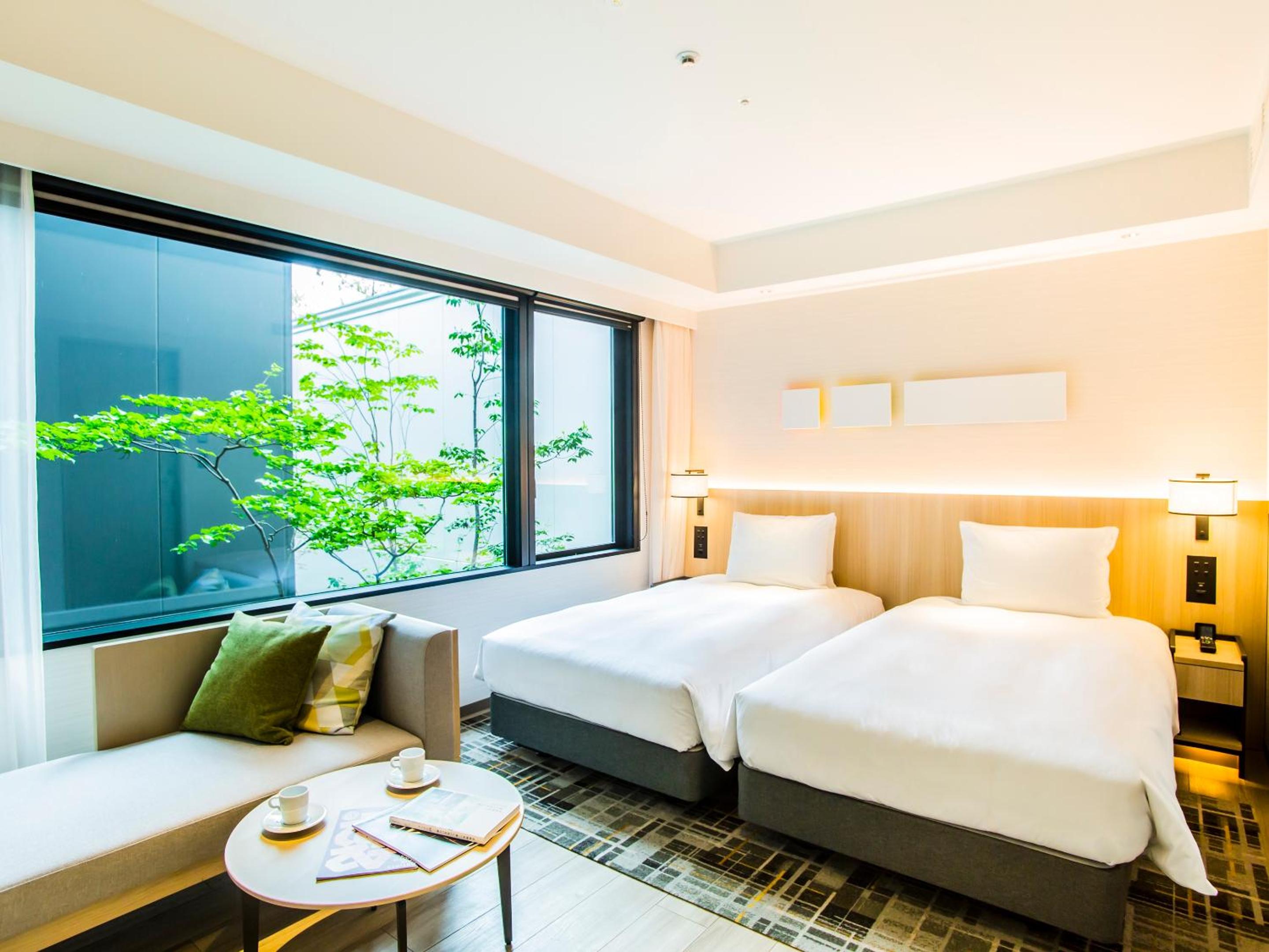 Premium Twin Room with Bathtub - Photo 10