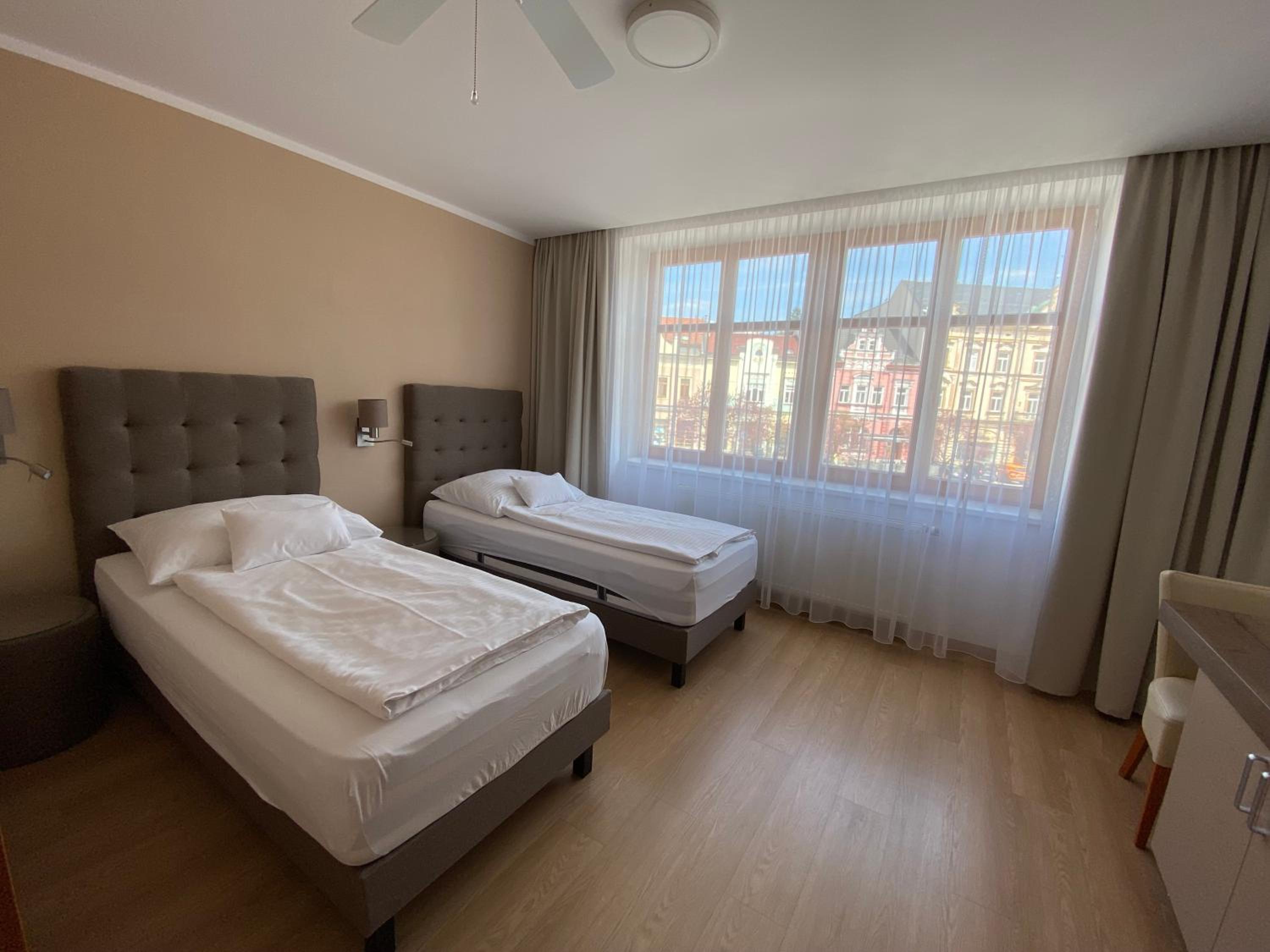 Twin Room - Photo 1