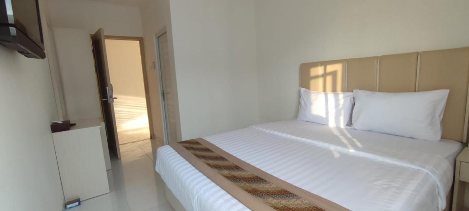 Deluxe Room - Photo 5