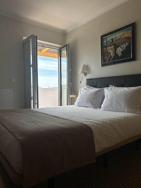 Double Room with Balcony - Photo 10