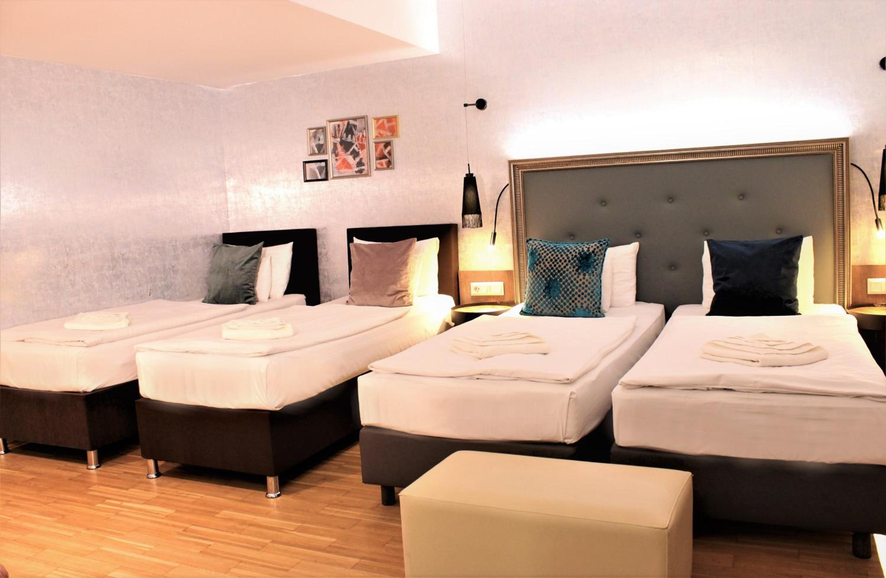 Deluxe Quadruple Room - Photo 1