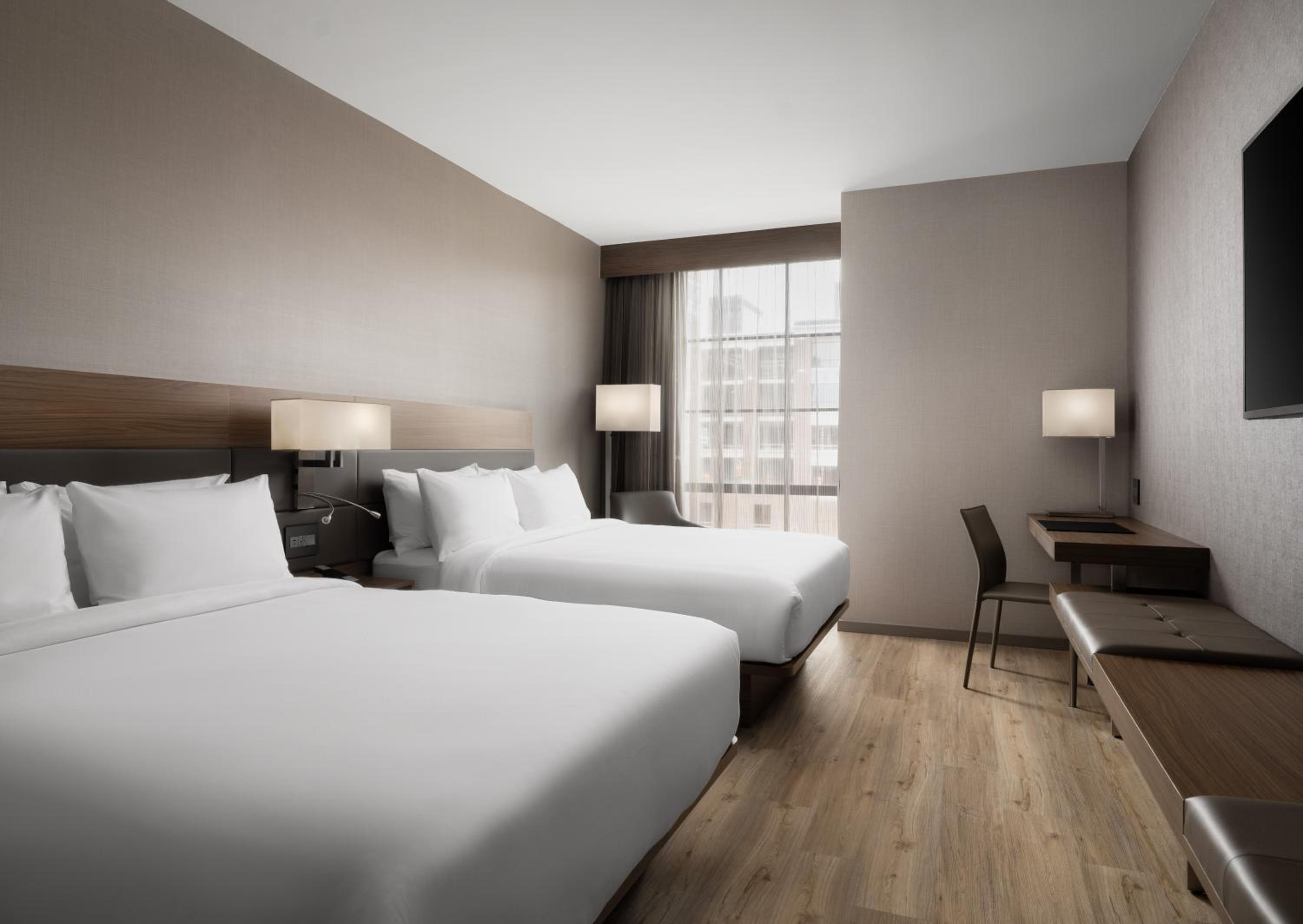 Standard Queen Room with Two Queen Beds - Photo 1