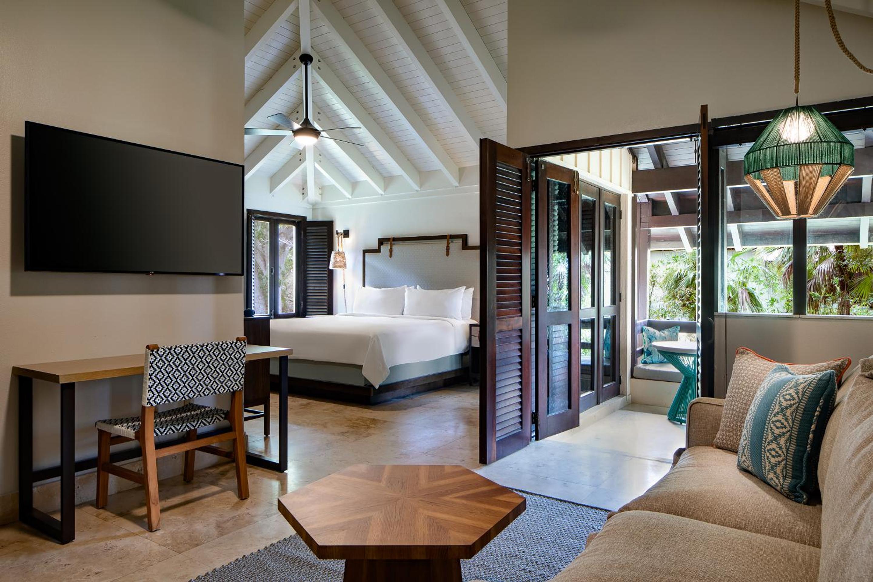 Junior King Suite with Sofa Bed, Kitchenette and Garden View