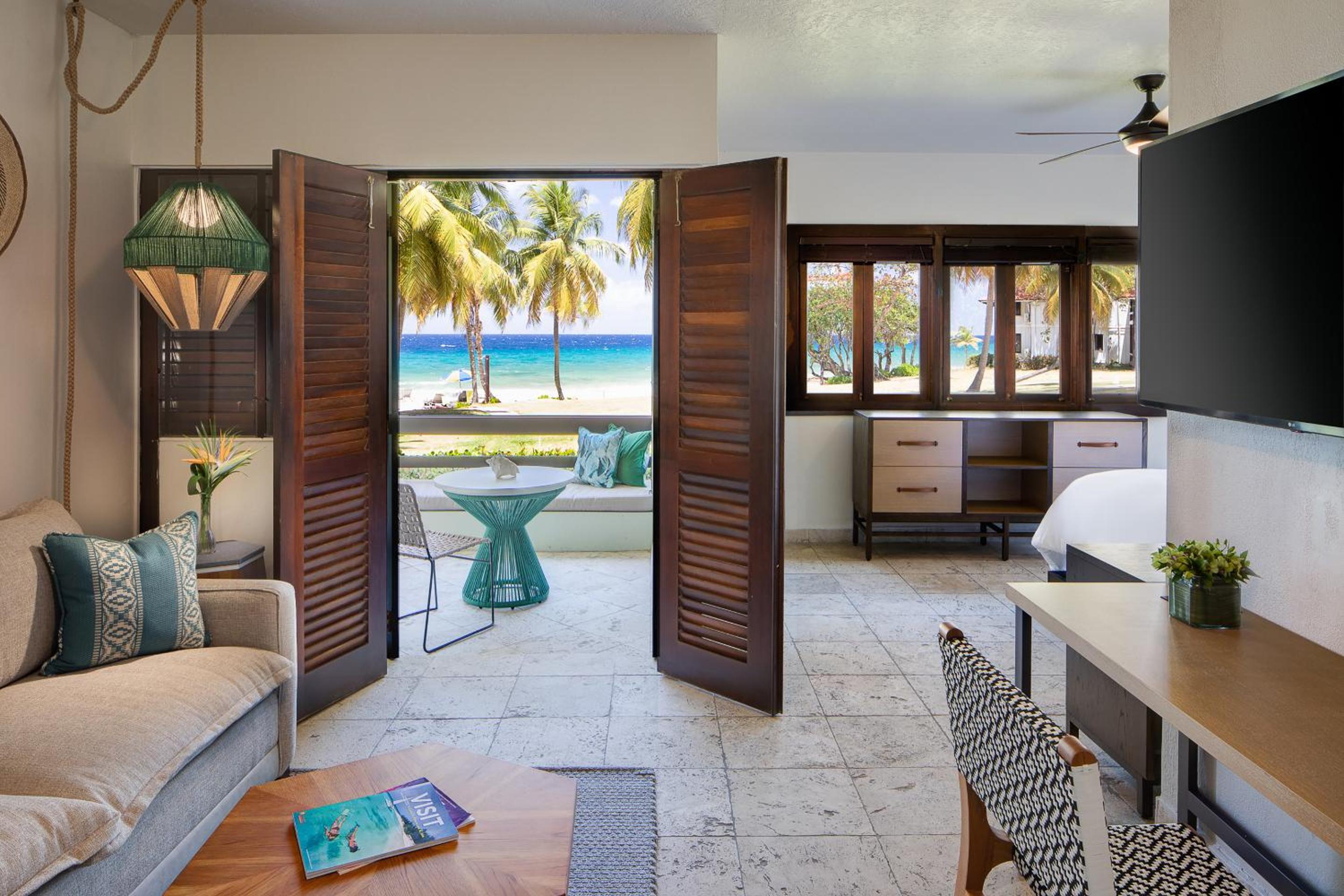 Junior King Suite with Sofa Bed, Patio and Garden View photo 2