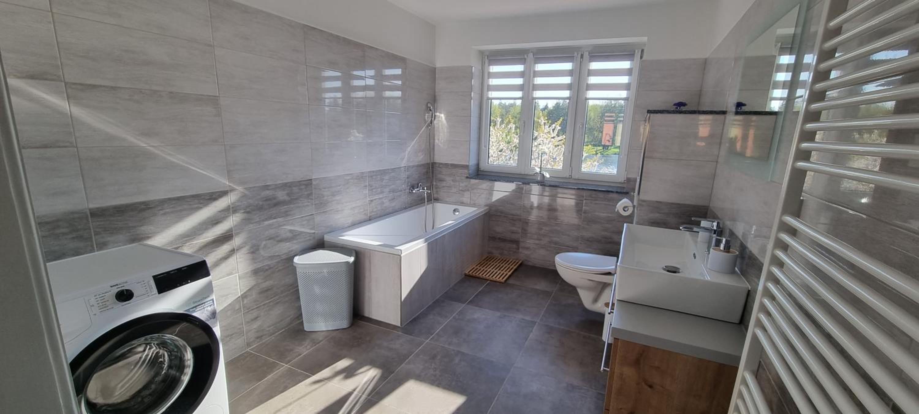 Three-Bedroom Apartment - Photo 11