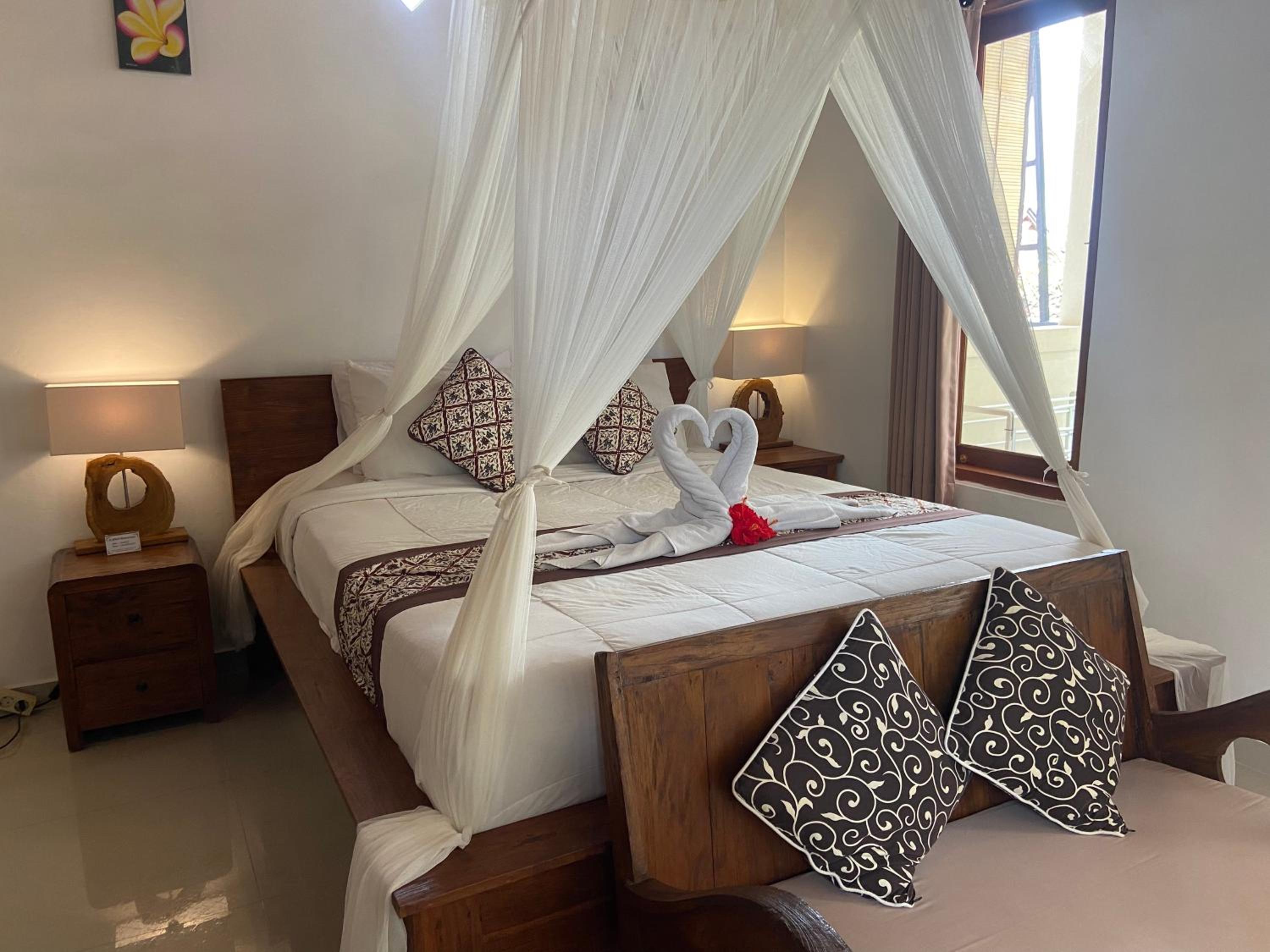 Deluxe Room (2 Adults + 1 Child) - Photo 30
