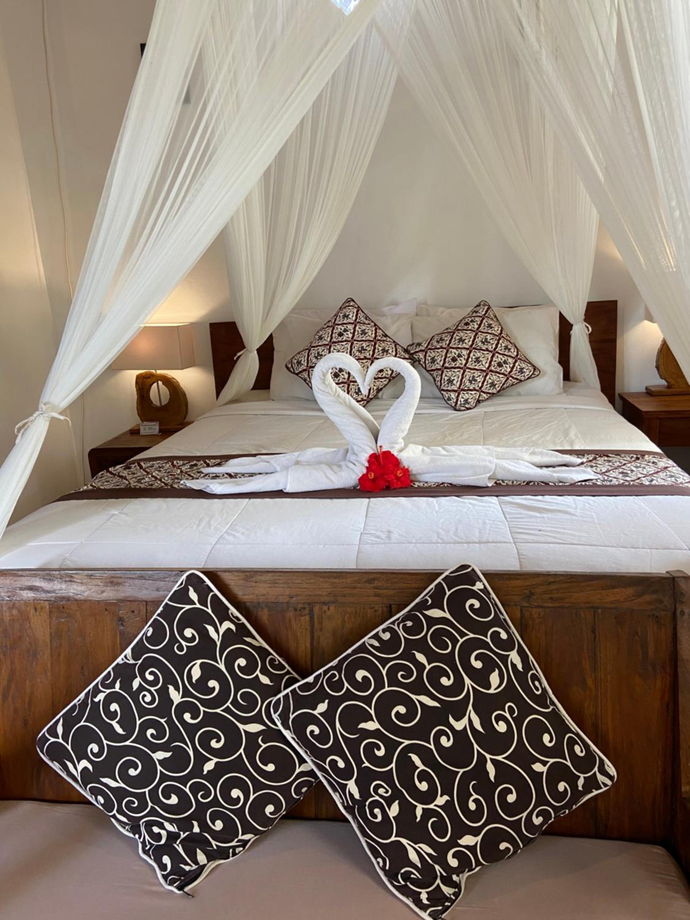 Deluxe Room (2 Adults + 1 Child) - Photo 3