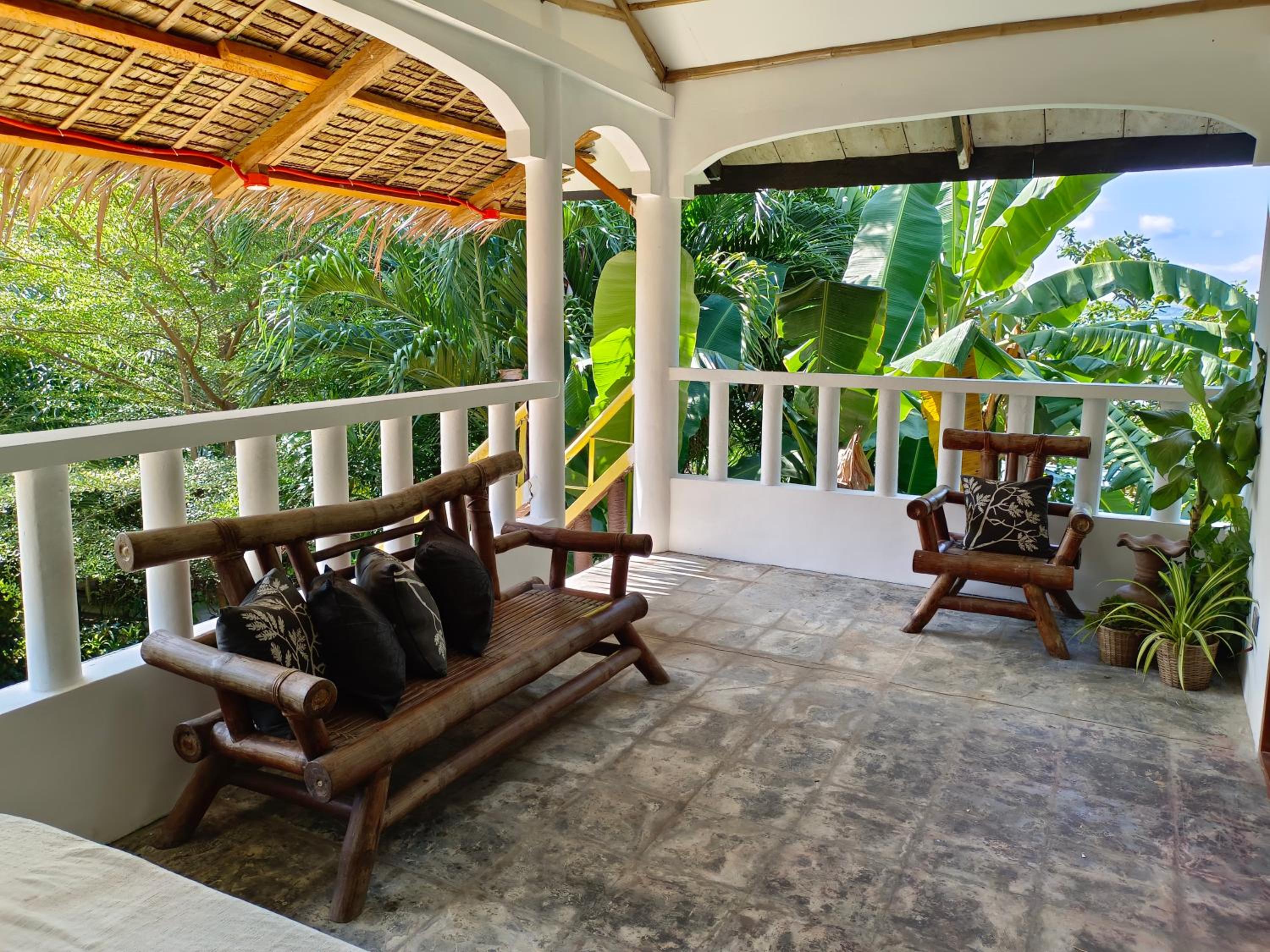 Quadruple Room with Balcony - Photo 12