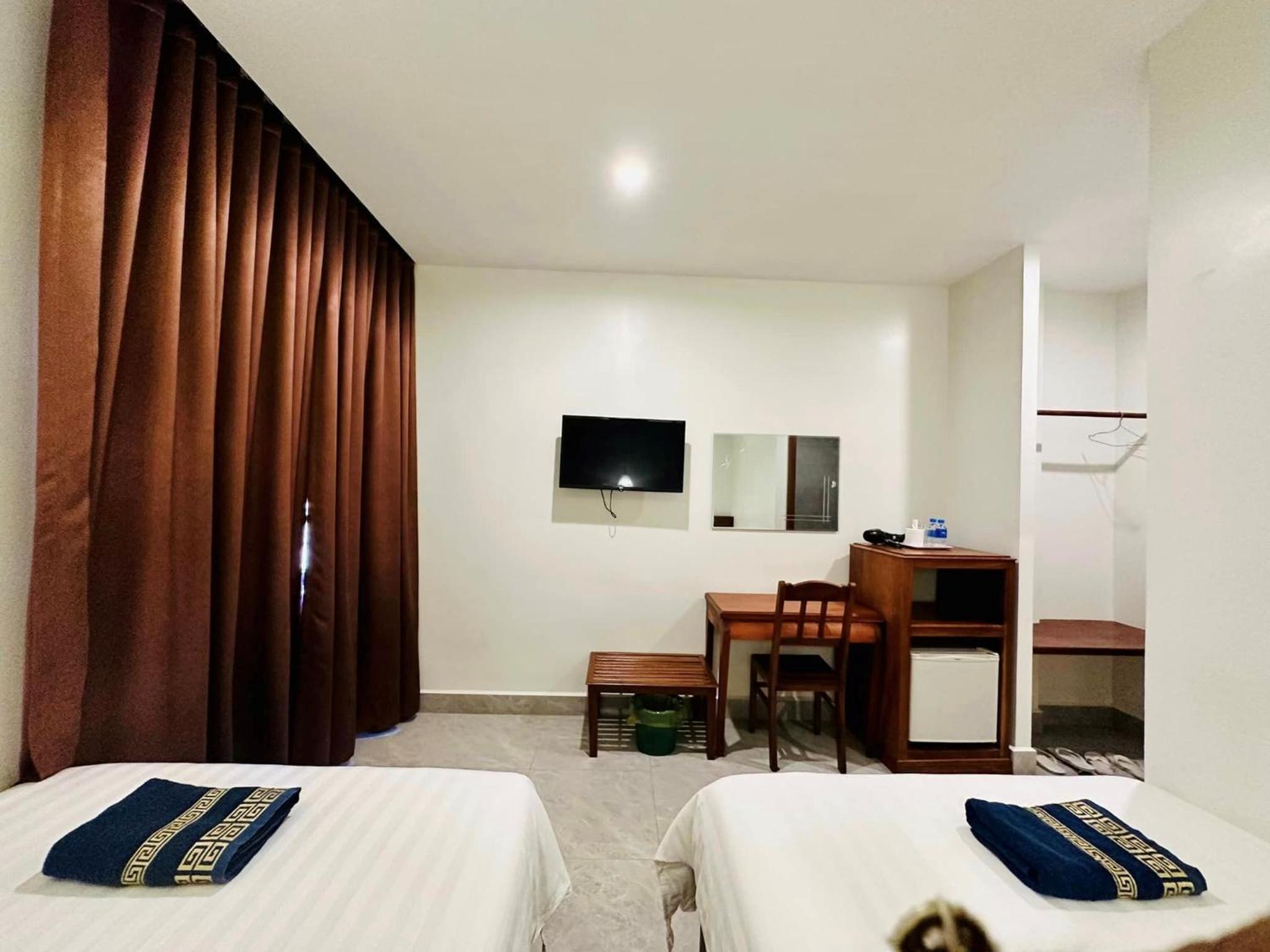 Twin Room - Photo 1