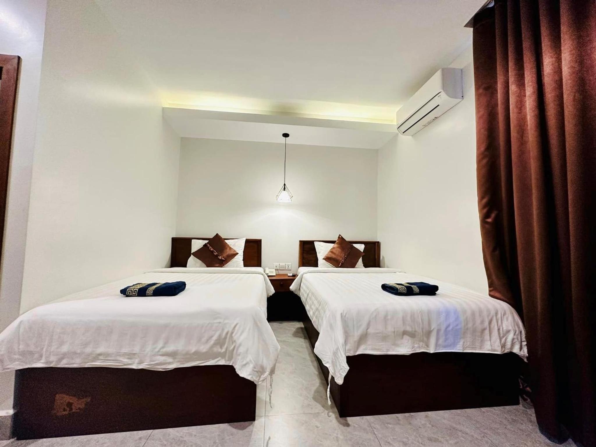 Twin Room - Photo 2