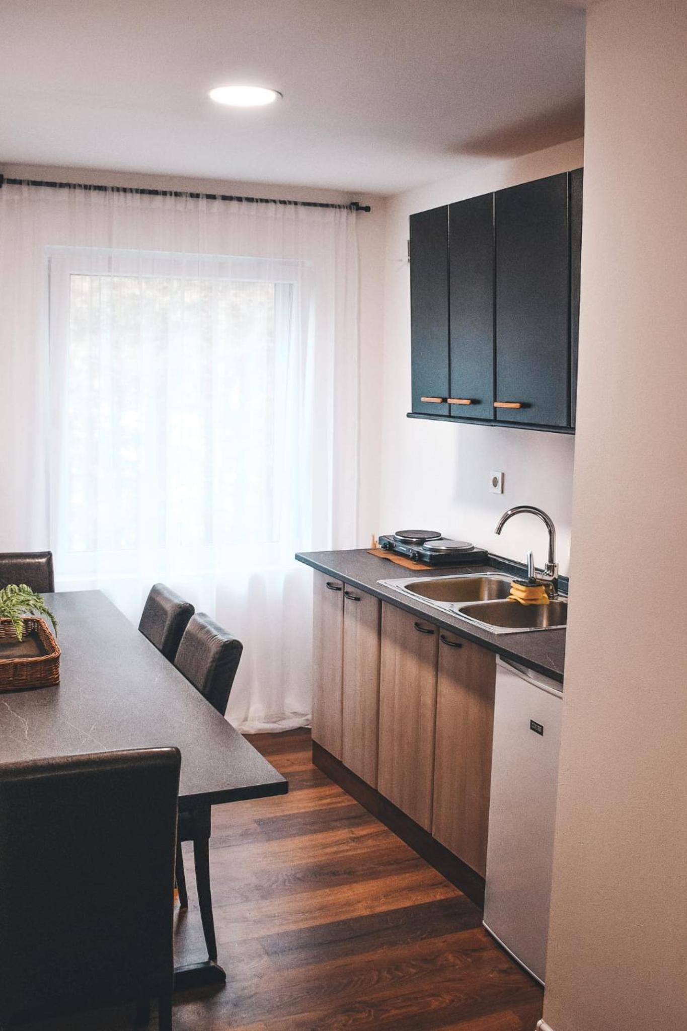 Three-Bedroom Apartment - Photo 22