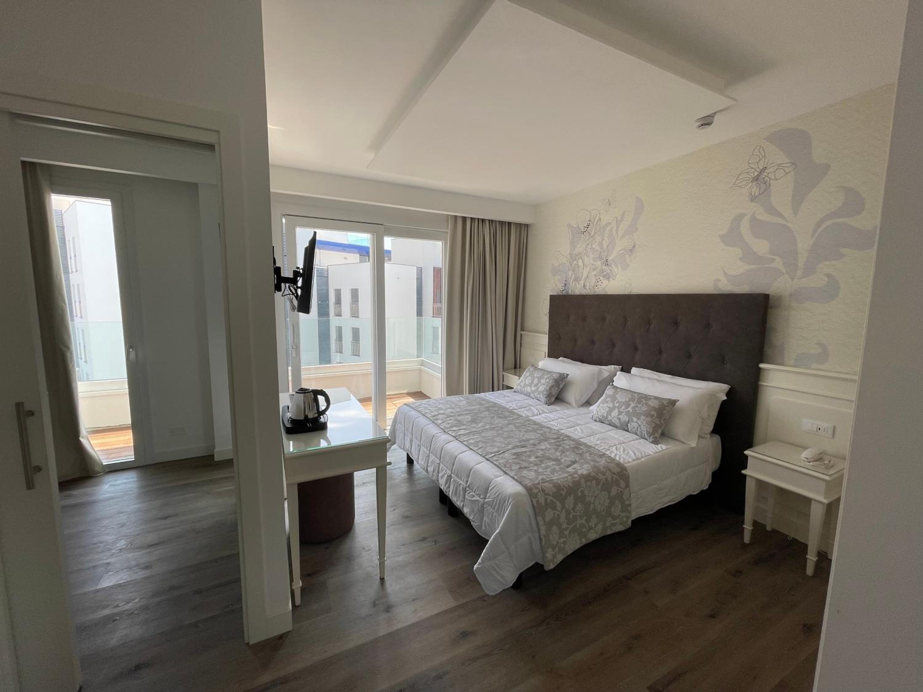 Deluxe Family Suite with Two Connected Rooms Balcony and Side Sea View