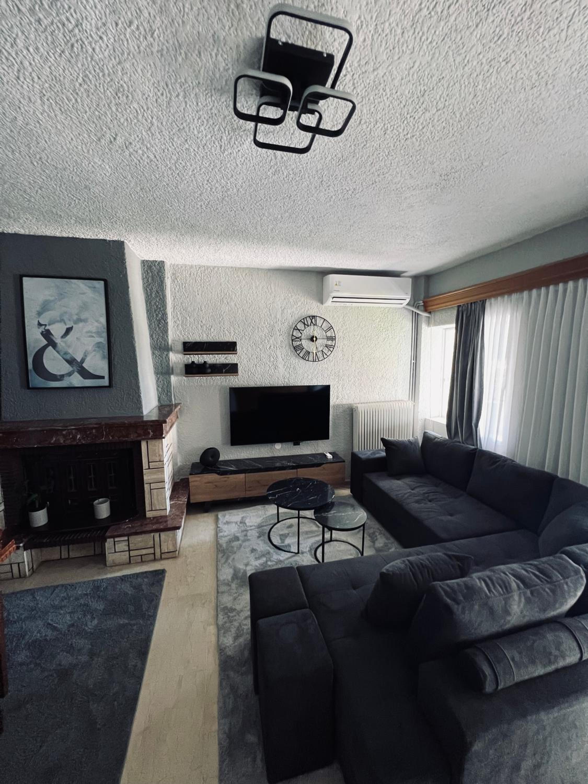 Three-Bedroom Apartment photo 1