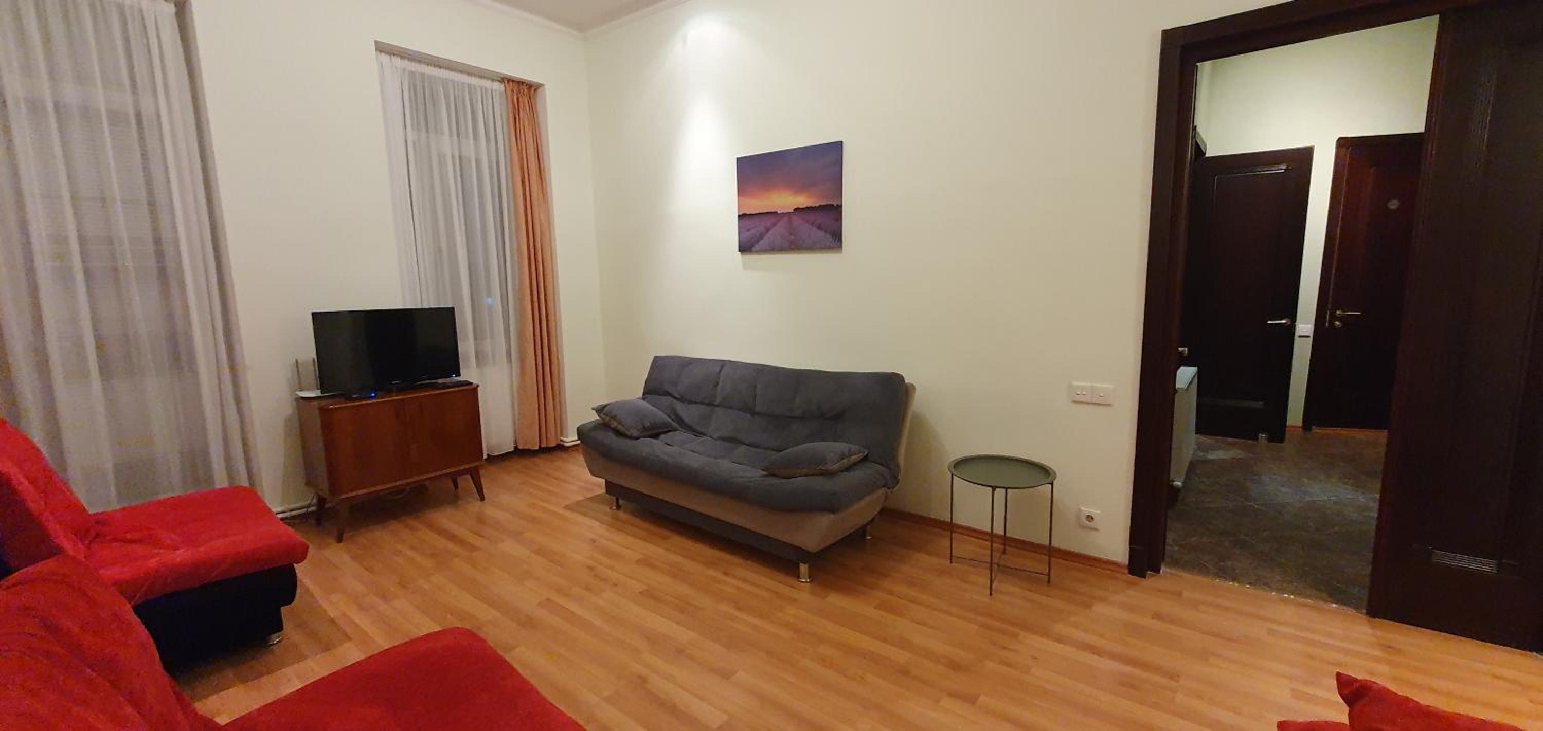 One-Bedroom Apartment with Balcony and City View - Photo 13