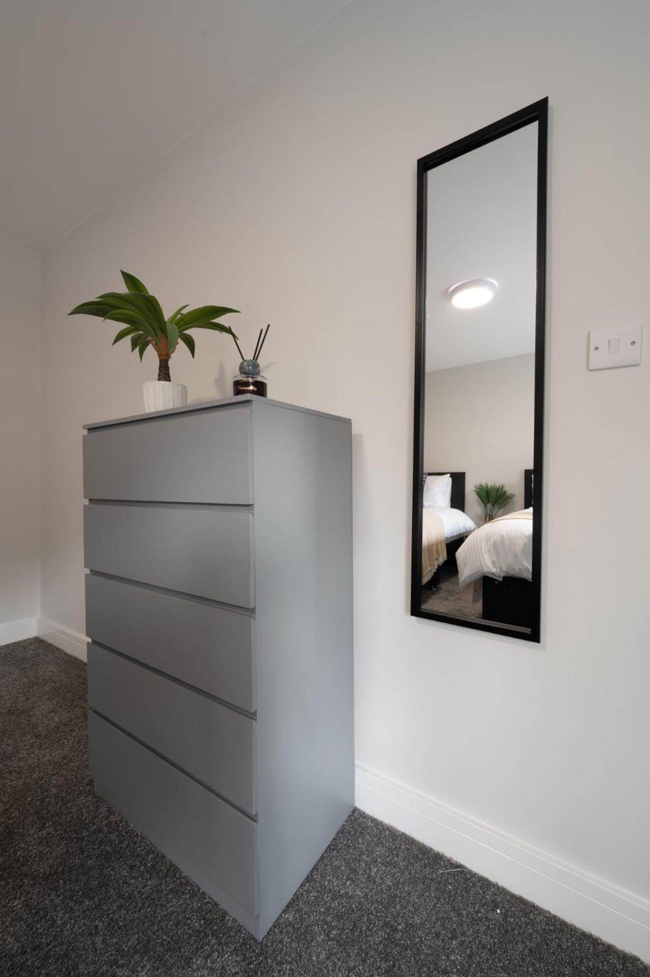 Three-Bedroom Apartment photo 1
