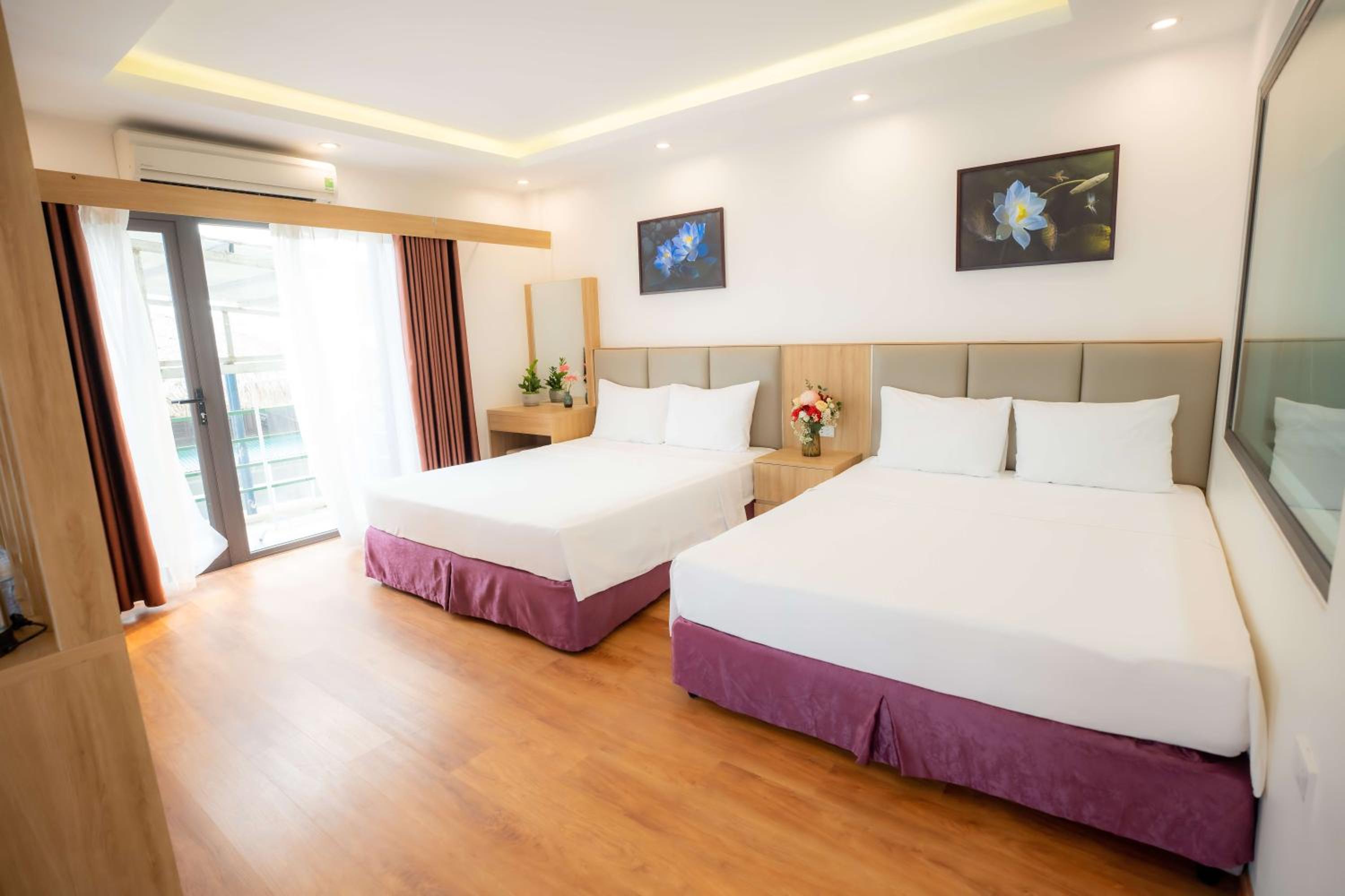 Deluxe Quadruple Room - Photo 5