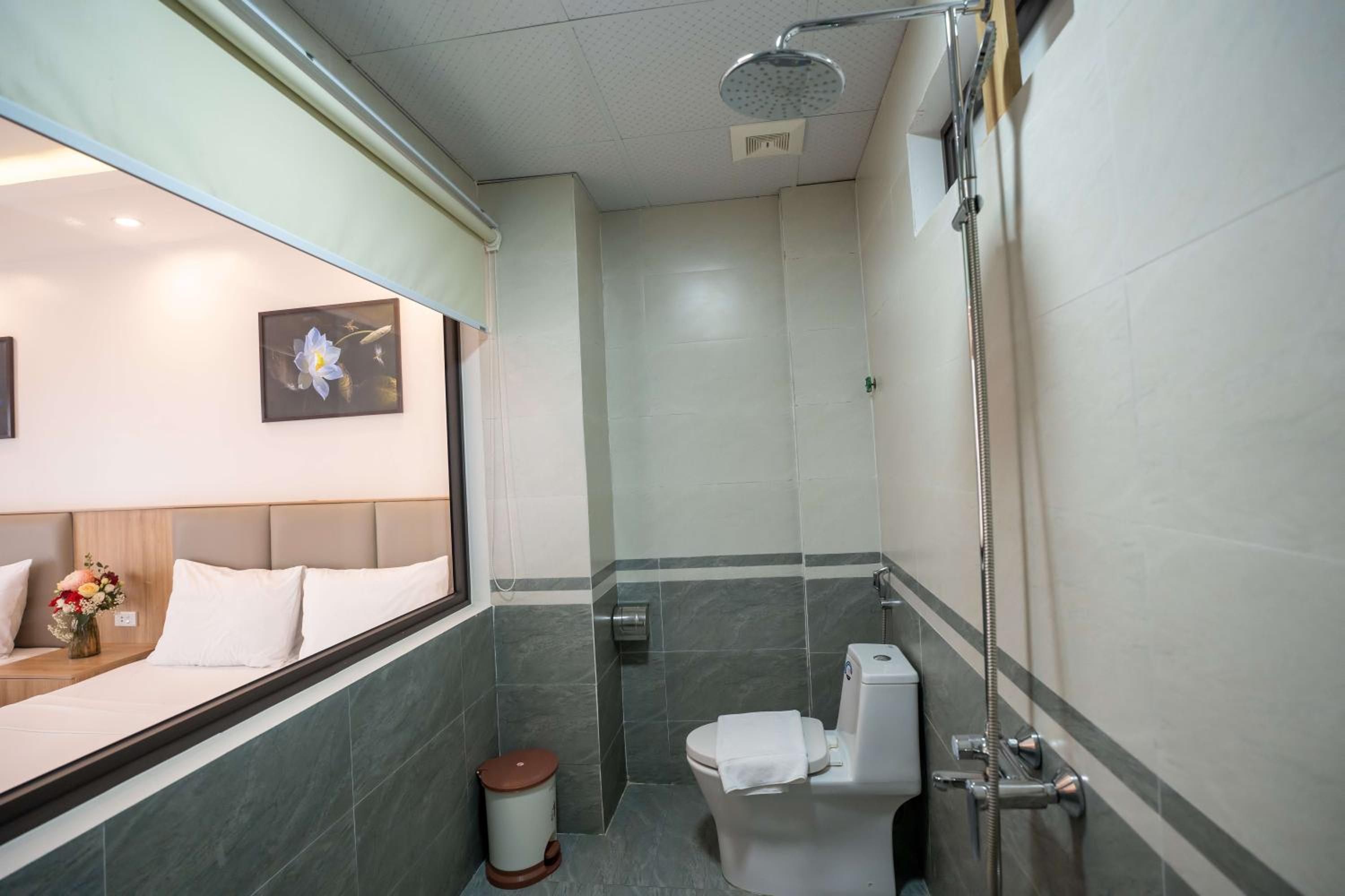 Deluxe Quadruple Room - Photo 12