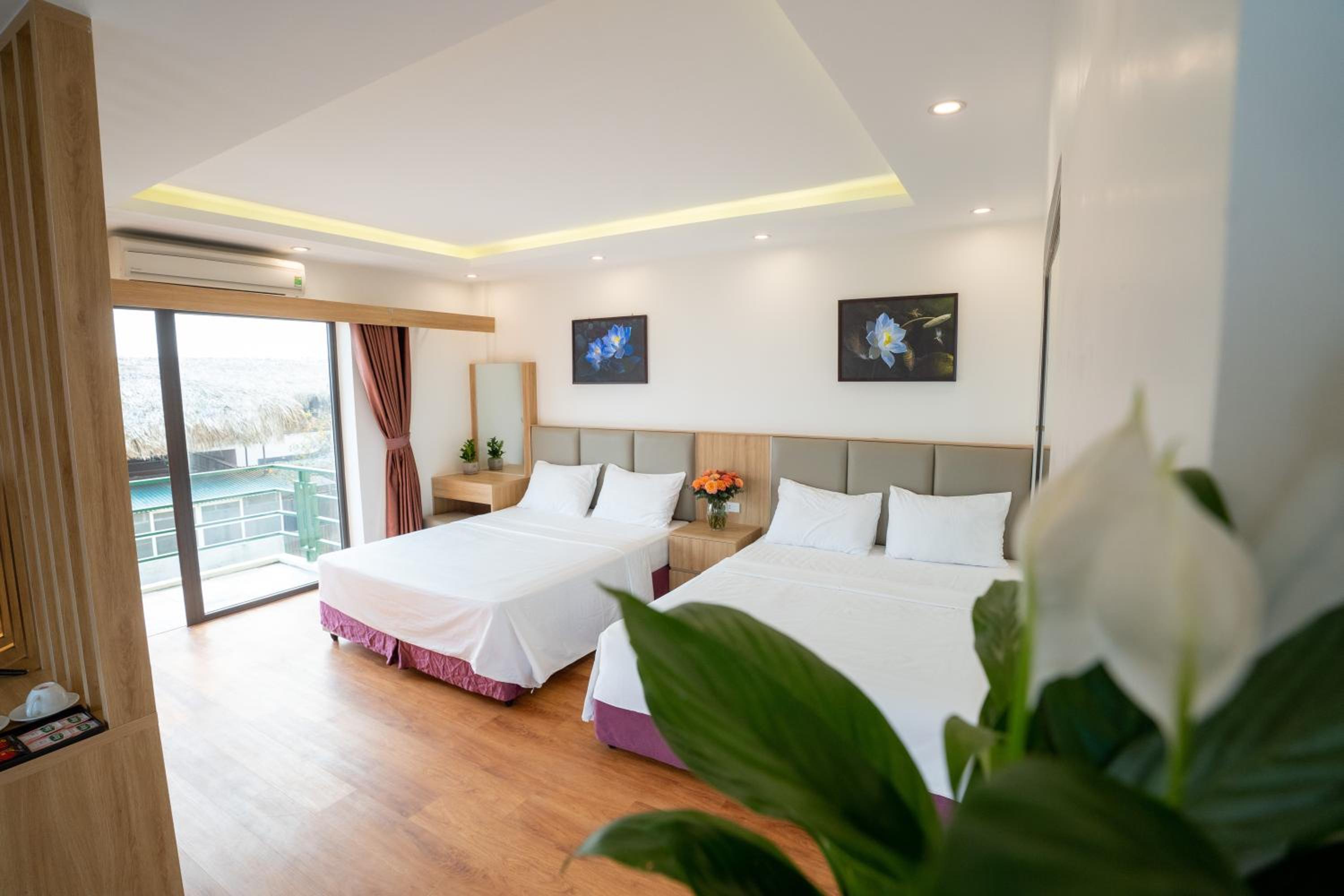 Deluxe Quadruple Room - Photo 6