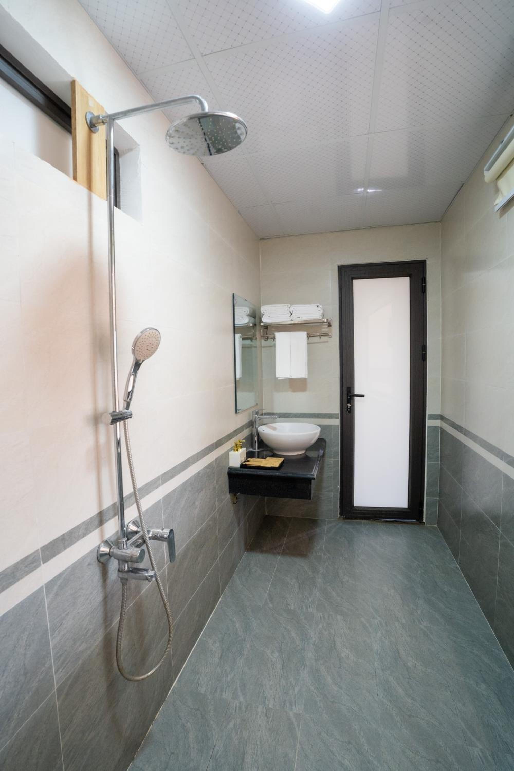 Deluxe Quadruple Room - Photo 9